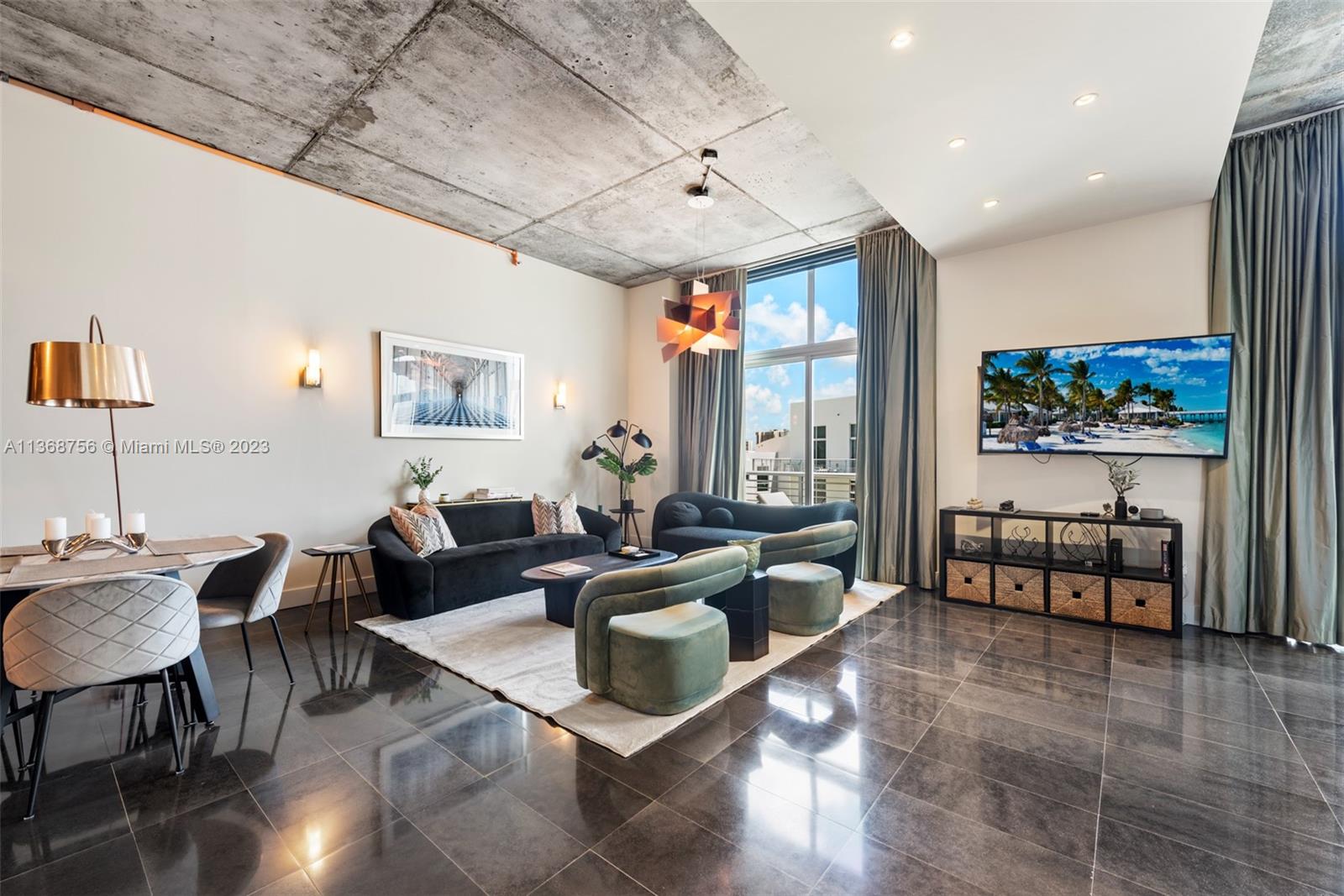 Custom-designed Penthouse at Meridian Lofts Condominium in the heart of Miami Beach, ideally situated next to Miami Beach Golf Club and Lincoln Road. Rare floorplan with high-end luxury upgrades and finishes. Loft-style 11” 3’ soaring ceilings and polished grey limestone flooring throughout. Poggenpohl kitchen cabinetry, complete bathroom renovation, large walk-in California Closets, motorized silk blackout drapes and shades, and floor to ceiling windows. Custom built office ideal for working from home. The building offers a rooftop heated swimming pool with Jacuzzi and a fully equipped gym. Meridian Lofts is a full-service building with an attended lobby in one of South Beach's finest and most walkable locations. Includes 1 assigned parking space.