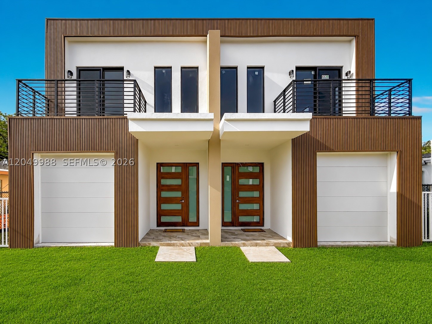 Discover exceptional new construction townhome. This beautifully designed 3-bedroom, 3.5-bathroom residence offers approximately 2,200 SF under A/C blending sophisticated design with everyday functionality.The open-concept floor plan features soaring ceilings, expansive living and dining areas, and a chef-inspired kitchen with premium finishes, custom cabinetry, quartz countertops, and a spacious island perfect for entertaining. A versatile first-floor den makes an ideal home office, playroom, or guest space.Upstairs, the luxurious primary suite offers a generous walk-in closet and a spa-inspired bathroom an oversized shower, and designer finishes. Two additional bedrooms each feature their own ensuite bathrooms, providing comfort and privacy for family and guests.
Enjoy seamless indoor-outdoor living with private outdoor space, a one-car garage, impact windows and doors, and contemporary architecture throughout. Ideally located just minutes from Coral Gables, Coconut Grove, Brickell, Downtown Miami, and Miami International Airport, with convenient access to some of the city's finest dining, shopping, parks, and top-rated schools.