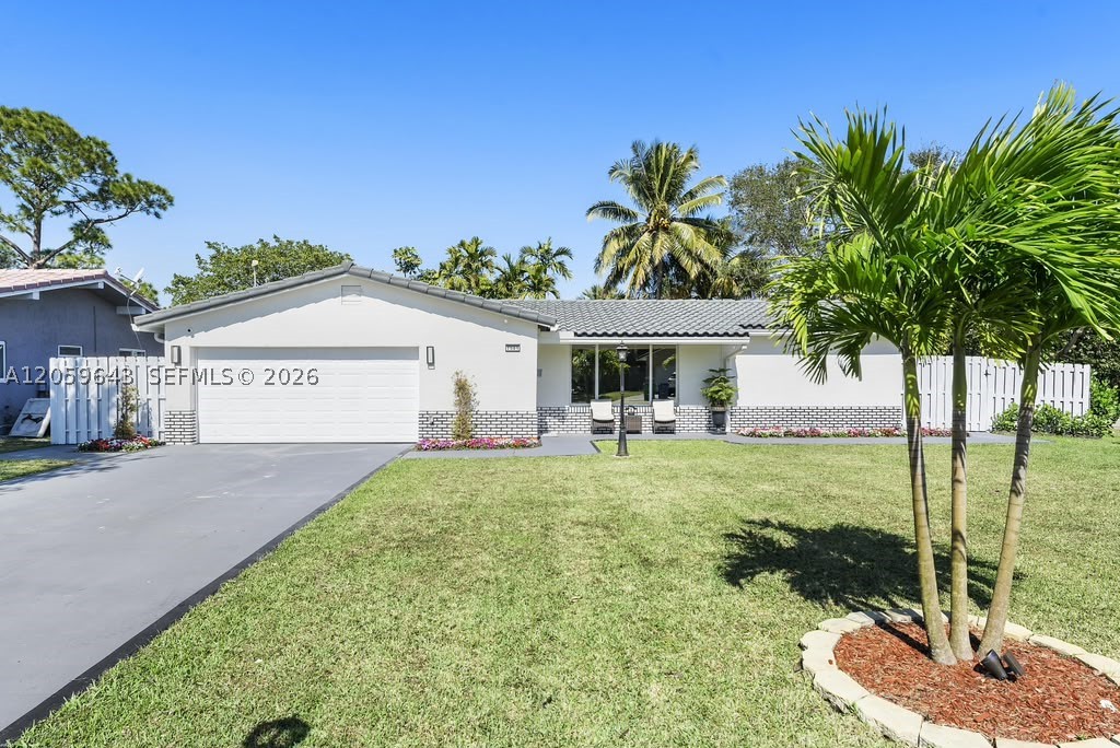Completely renovated and move-in ready! This stunning 3-bedroom, 2-bath home has been beautifully updated with quality finishes throughout. The show-stopping custom-designed kitchen features modern cabinetry, premium countertops, and a spacious layout that is perfect for everyday living and entertaining. Enjoy an open-concept floor plan filled with natural light, elegant tile flooring throughout, updated bathrooms, and a versatile Florida room that offers additional living space. The oversized backyard provides exceptional privacy with no rear neighbors and plenty of room to build your dream pool or create the perfect outdoor retreat. Located in the highly desirable community of The Dells with NO HOA, this home is just minutes from top-rated schools, parks, shopping, dining, and major highways. A rare opportunity to own a fully renovated home in one of Coral Springs' most sought-after neighborhoods. Schedule your private showing today!