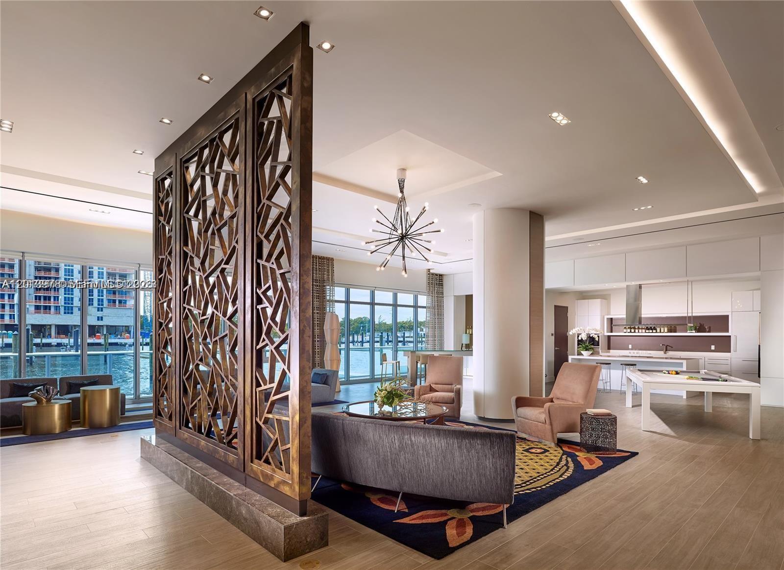 enjoy amazing views of the Intracoastal, in this 2 bed 2.5 bath condo with floor to ceiling windows, large modern kitchen and split floor plan with a freestanding soaking tub in the master bedroom. This building offers extravagant array of luxuries including a spa, pool, fitness center, clubroom, professional studio, activity rooms for kids, 24-hour security, and much more. In addition to the resort-style living offered by Marina Palms, the excellent location of the building provides an endless list of restaurants, parks, etc. Unit is rented for $5900 monthly till August 9th 2026. There is a 60 days' clause. read broker remarks for showings!!!!! Association fees (maintenance) to be confirmed.