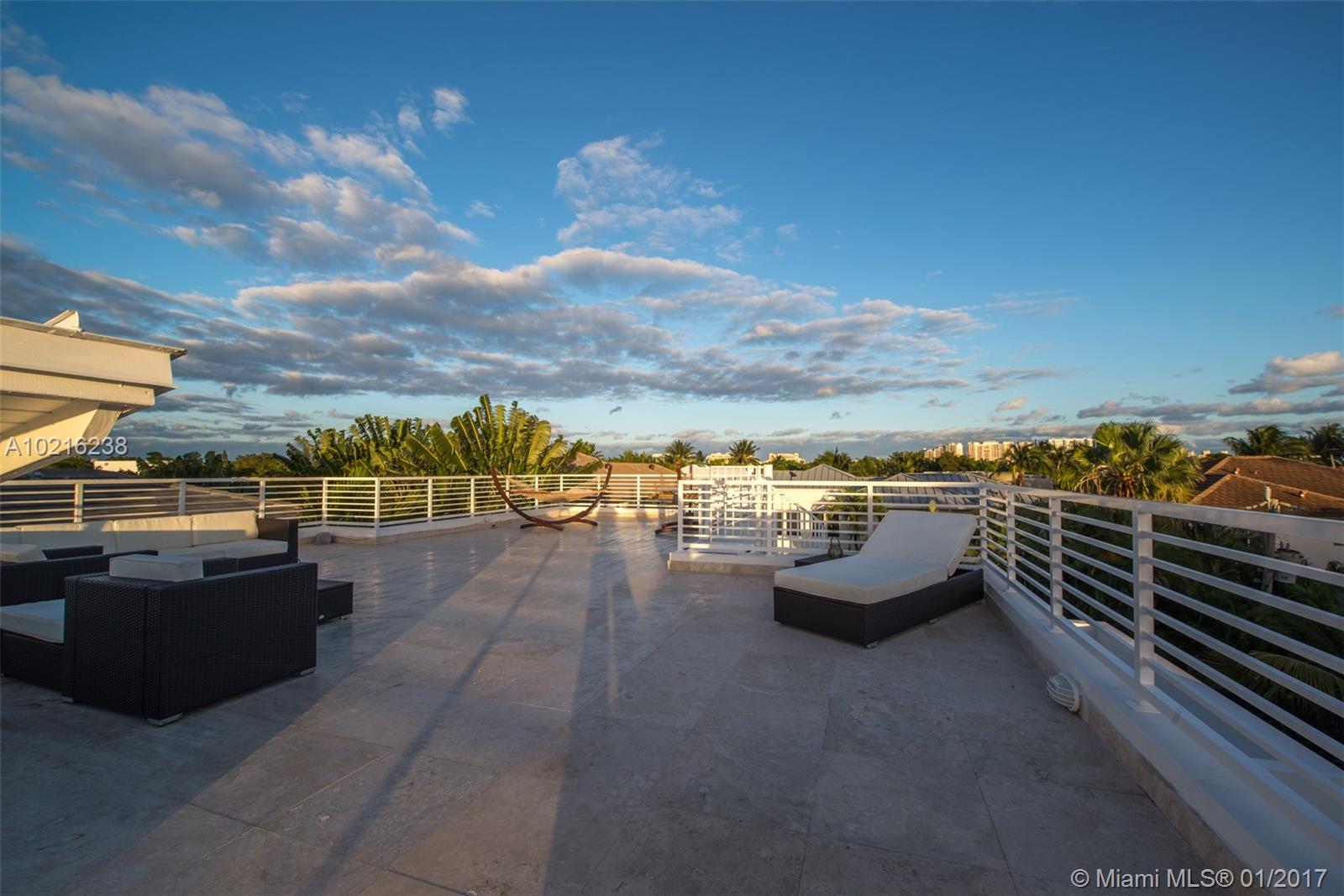 Contemporary exquisite residence built in 2016. 5 oversized bedrooms & 5 bathrooms. No details have been spared. Fully enclosed. Private & protected. Impact glass doors & windows. Elevated. Height ceilings: 12 / 20 ft in reception area. Generator. LED lights t/o the house. Equipped w/ domotic Control 4 system. Wolf kitchen equipment (Gas stove, Microwave & conventional) Refrigerator Subzero. Wine cooler. Kitchen Cabinets & doors by Mia Cucina. Black infinity oversized pool with Spa & Salt system.  SEE ATTACHMENTS.