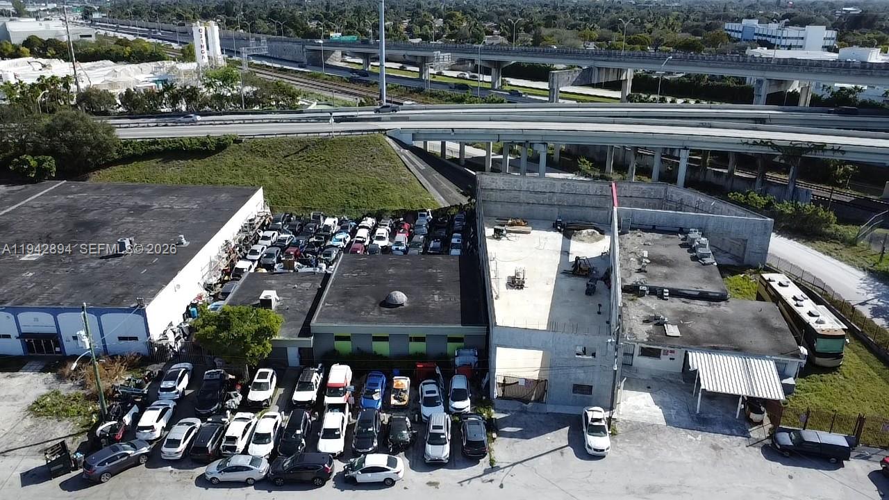 Exceptional Commercial Opportunity in Prime Miami Location Unbeatable Flexibility, Features, and Access for Your Business Vision. Seller Motivation & Financing:Take advantage of highly motivated sellers welcoming all serious offers. Flexible financing options mean you can secure this outstanding property with ease—making your business dreams more attainable than ever. Property Features Discover 3,981 sq.ft. of versatile office and warehouse space on a generous 15,000 sq.ft. lot in the heart of Miami’s thriving Golden Glandes district. The facility is equipped with two modern bathrooms, a convenient kitchen, four private offices, and efficient central AC—perfect for a wide array of commercial operations.Prime Location Position your business for success with unbeatable proximity to I-95, Florida Turnpike, Palmetto, and 441. Effortless access to both Miami and Fort Lauderdale Airports and premier amenities like Top Golf, Walmart, and Public Storage ensures convenience for your team and clients alike. Zoning-Use Benefit from flexible PCD zoning—currently ideal for automotive storage, but equally suited for warehouse, logistics, mechanical, or construction ventures. No association means fewer restrictions, granting you the freedom to tailor the space to your unique needs. Enjoy maximum flexibility: the property’s month-to-month rental status allows you to take immediate possession or continue collecting rental income—seamlessly transitioning to your preferred ownership strategy.