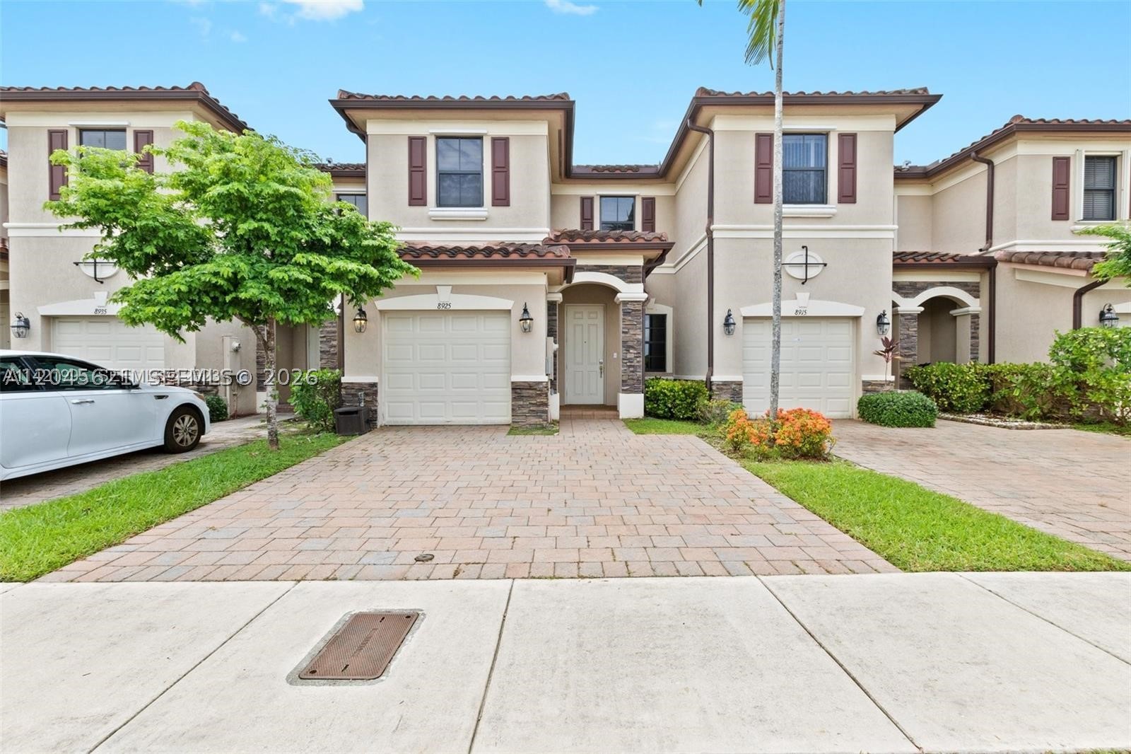 Beautifully maintained 3-bedroom, 2.5-bath townhome located in the highly sought-after gated community of Aragon. This move-in-ready home features an open-concept layout with tile flooring on the main level, vinyl flooring upstairs, and a modern kitchen overlooking the spacious living and dining areas. The home also offers a one-car garage with an EV charging connection, full-size washer and dryer, and guest parking conveniently located in front of the home. Residents have access to resort-style amenities including a clubhouse, fitness center, swimming pool, and playground. Enjoy a private backyard with artificial turf and no rear neighbors, perfect for relaxing or entertaining.