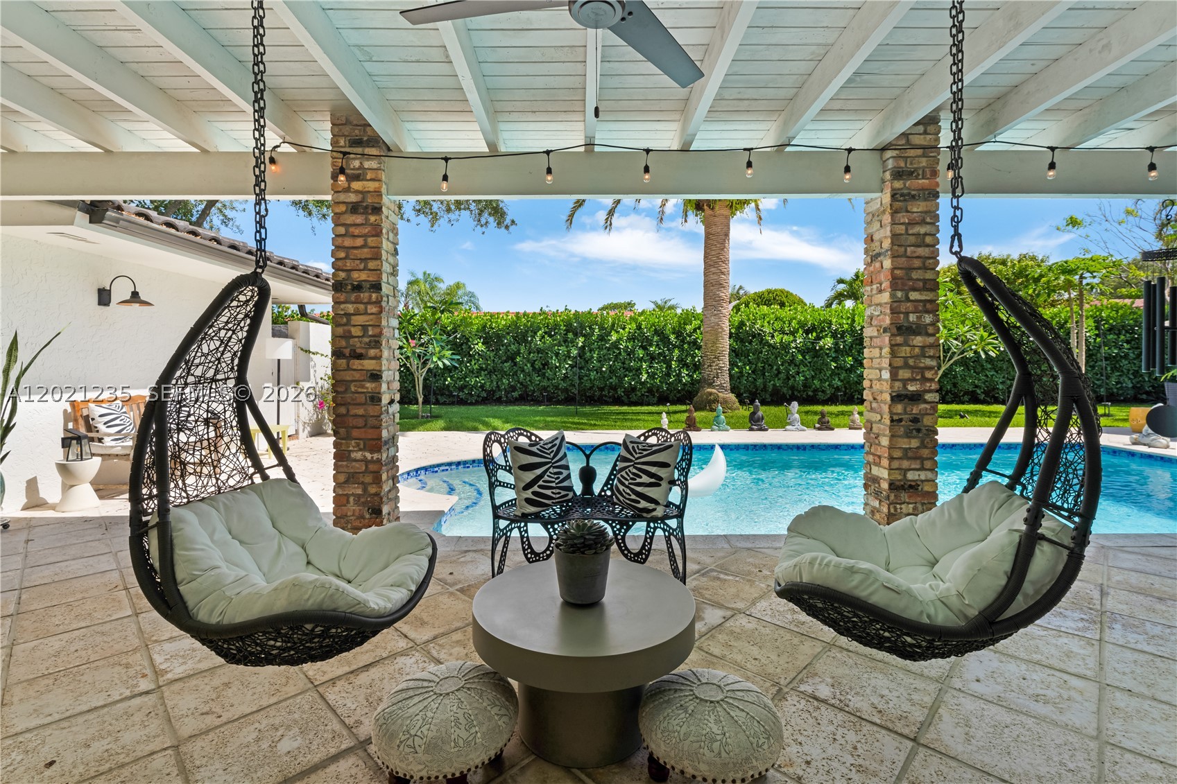 Light-filled, Zen cul-de-sac retreat!  This super spacious, move-in-ready, warm and inviting 4-bedroom, 3-bath plus office oozes positive vibes and tranquility, and boasts renovations such as impact windows and doors, a new kitchen, two new bathrooms, new ACs, a new electrical panel, travertine flooring, professional landscaping, PVC plumbing, and an 8-year-old roof. Enter an extra-large living and dining room with soaring vaulted ceilings and tropical outdoor views. The newly renovated kitchen opens to an eat-in area and spacious family room with a fireplace. Travertine stone floors throughout living areas, oversized bedrooms, and a grand owner's suite features a new custom bath and a sizable walk-in closet. Plentiful impact French doors & windows throughout open to a full pool/patio with a large overhang overlooking lush landscaping and a private backyard perfect for outdoor enjoyment. Fall in love with this light-filled home in a sought-after cul-de-sac neighborhood steps away from beautiful parks & top-rated public/private schools. Who is ready to call this fantastic zen oasis home?