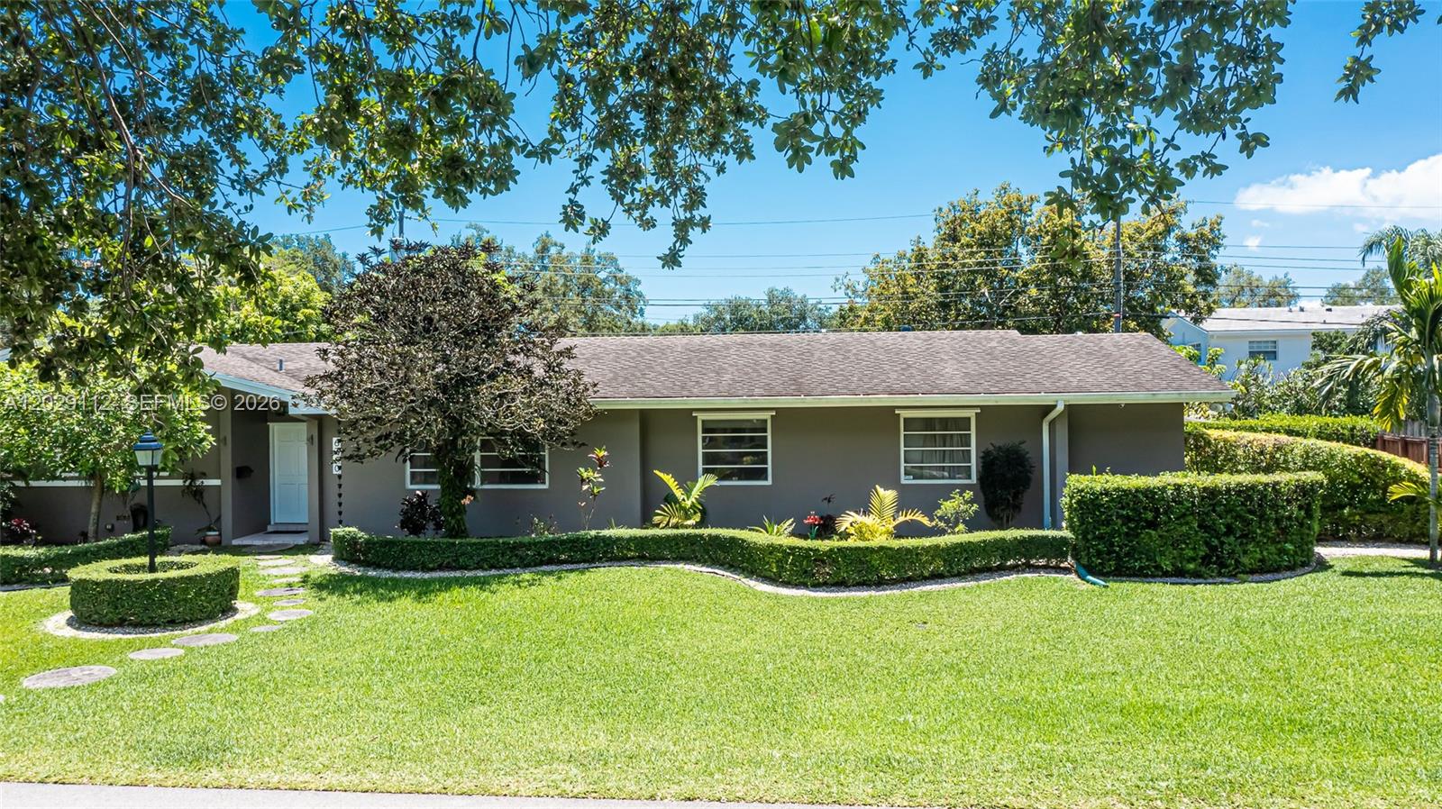 Bring your architect, designer, and vision to this South Miami renovation canvas. Commanding a prime, oversized corner lot, this solid 1966 concrete block home is offered for the first time in its history. Custom-built by the seller and exclusively lived in by a single family, its rare, single-owner pedigree guarantees an uncompromised structural baseline. The property is a true mid-century time capsule preserved in its original condition. Vintage design purists will appreciate the untouched character pieces, including the retro kitchen and classic pink & blue bathrooms with double sinks. The floor plan features a 2-car garage and is flooded with natural light, offering an ideal footprint to configure a modern open-concept flow. To understand the immense potential here, one must look at the surrounding neighborhood dynamics, where luxury homes in SoMi have recently sold for >$6.5M. Even though those properties represent brand-new construction and this is a classic 1966 footprint, there is undeniable value built into this estate. Purchasing a home with this level of structural integrity allows a buyer to bypass the heavy lifting of starting from scratch while capturing the same prestigious neighborhood prestige. Perfectly situated, you are minutes away from top schools, parks & major corridors. Whether your goal is a custom remodel or a high-yield design flip, a corner lot of this magnitude with single-owner frame presents a great foundation. Strictly sold AS-IS, PRICE FIRM.