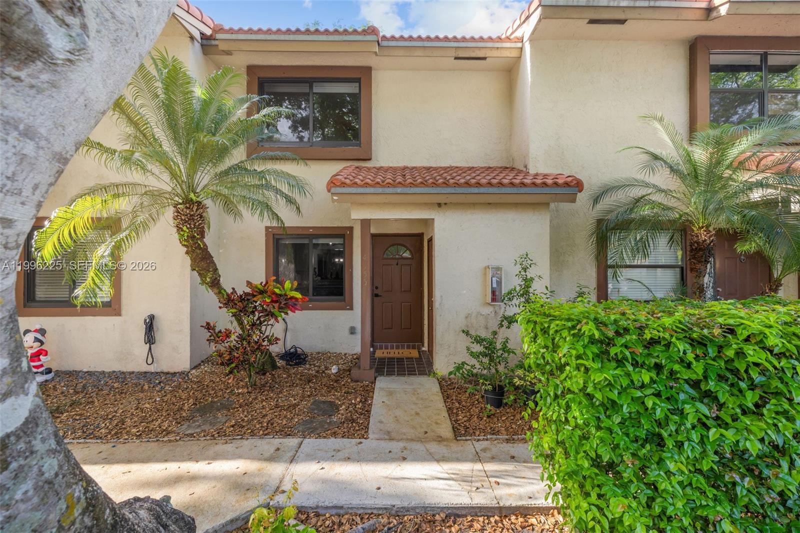 Welcome to this stunning and meticulously maintained townhouse in the exclusive Lovins Townhouse Condo community one of only 21 residences and the only unit currently available. This beautifully upgraded home features brand new flooring installed in 2024, in-unit washer/dryer, gorgeous Calacatta countertops and backsplash, fully remodele bathrooms, and a modern kitchen equipped with stainless steel appliances. Additional highlights include zebra blinds throughout, baseboards, and impact windows for complete peace of mind.
Outside, enjoy your own private backyard perfect for relaxing or entertaining — along with 2 assigned parking spaces and generous storage throughout. The HOA covers water, roof maintenance, and exterior insurance, making ownership truly hassle-free.
Located in a highly sought-after community with A-rated schools and unbeatable convenience — just minutes from shopping malls, restaurants, grocery stores, public transportation, hospitals, and more. No rental restrictions, all ages welcome, investor friendly and pet friendly. A rare opportunity in this intimate community — don't miss it!