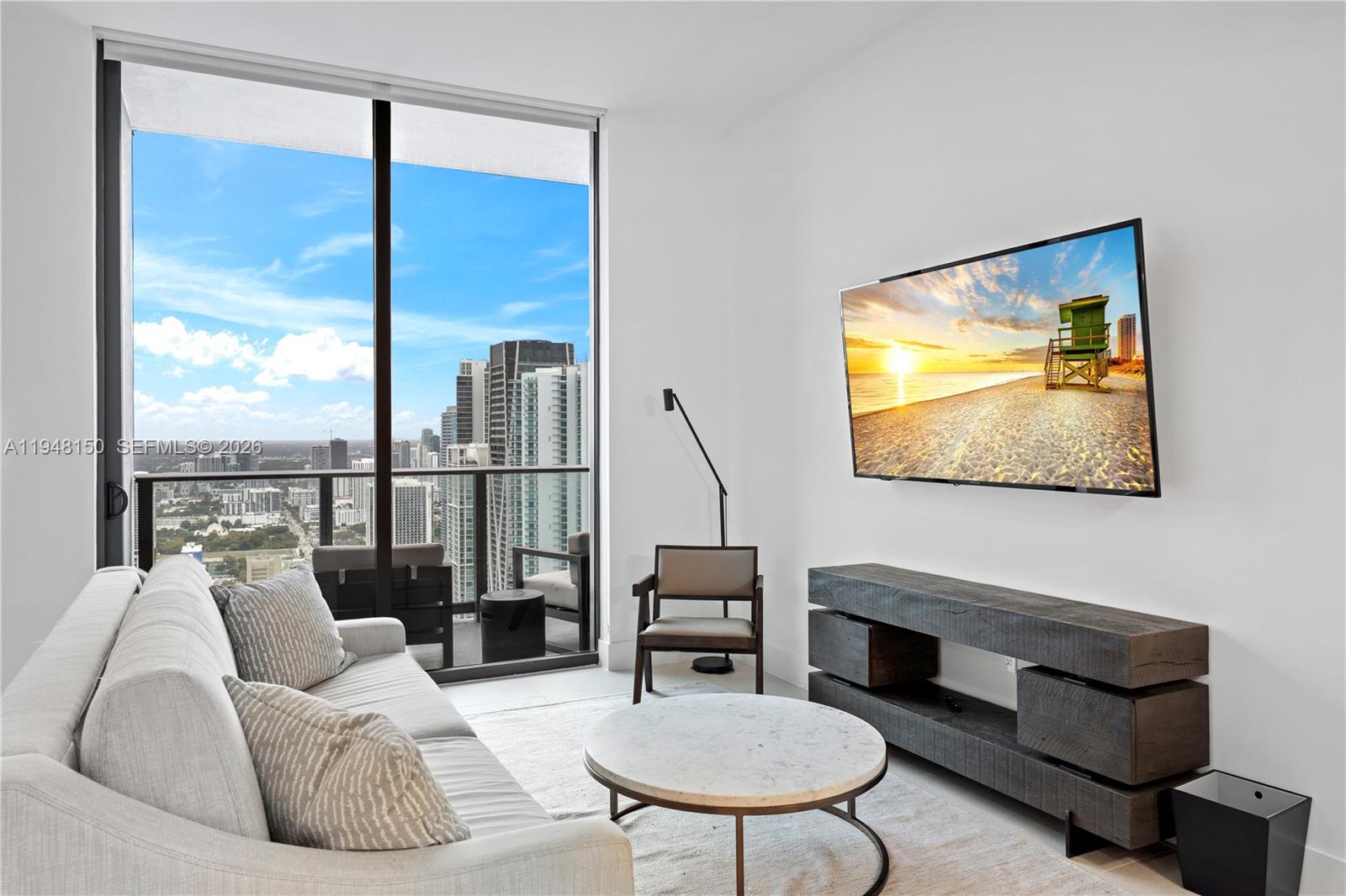 Gorgeous, fully furnished residence located on the highest floors of Gale Hotel & Residences. This bright 1-bedroom features an expansive living area with a dedicated dining space, and a private terrace showcasing stunning views of Downtown Miami’s skyline. Includes a premium Restoration Hardware furniture package.

The residence offers an elegant, modern kitchen with custom cabinetry and high-end European appliances, along with in-unit washer, dryer, and dishwasher.

Enjoy resort-style amenities in a prime location, just steps from Bayside Marketplace and Bayfront Park, and within walking distance to the best of Miami’s vibrant lifestyle. Short-term rentals permitted—an exceptional opportunity for investors.