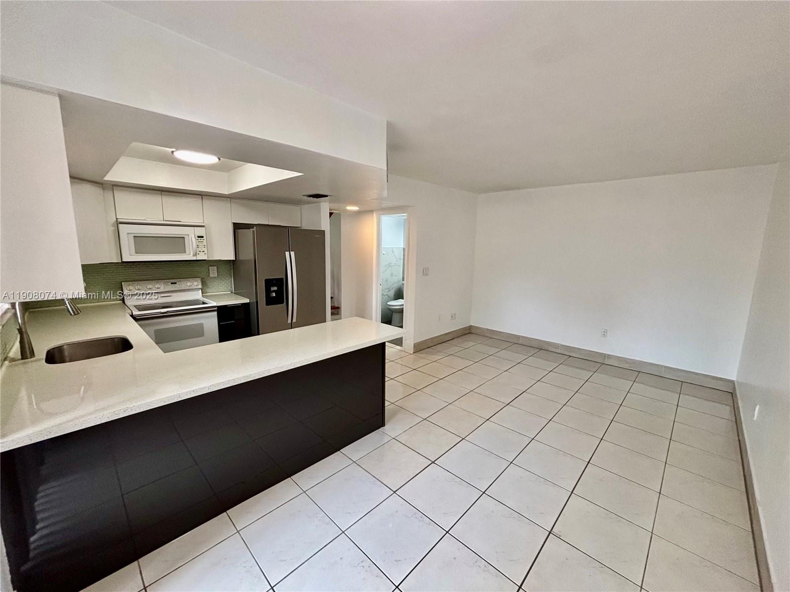 KENDALL FORESTS CONDO #2 - Residential Lease