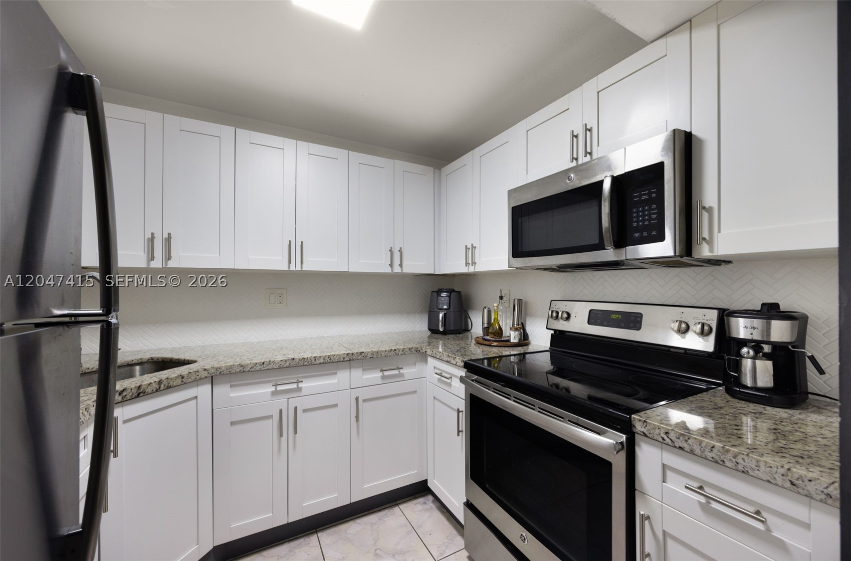 PENINSULA AT INTL GARDENS - Residential