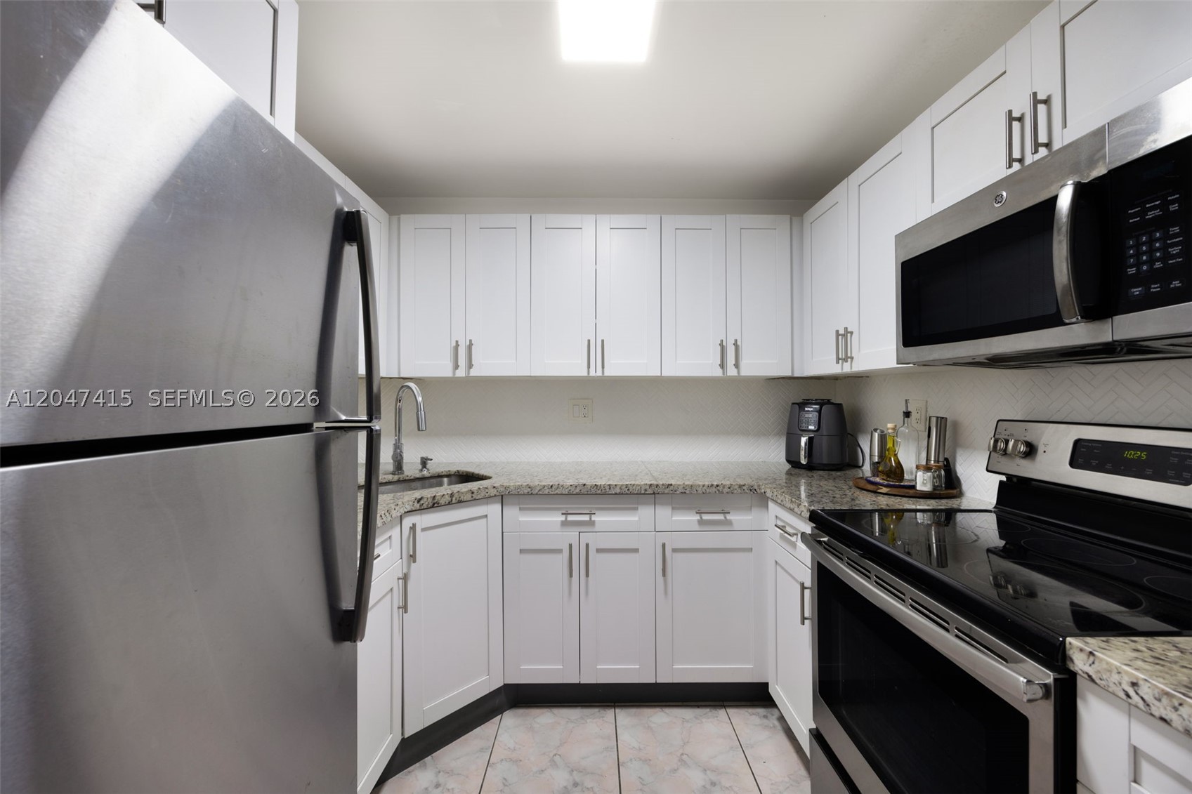 PENINSULA AT INTL GARDENS - Residential