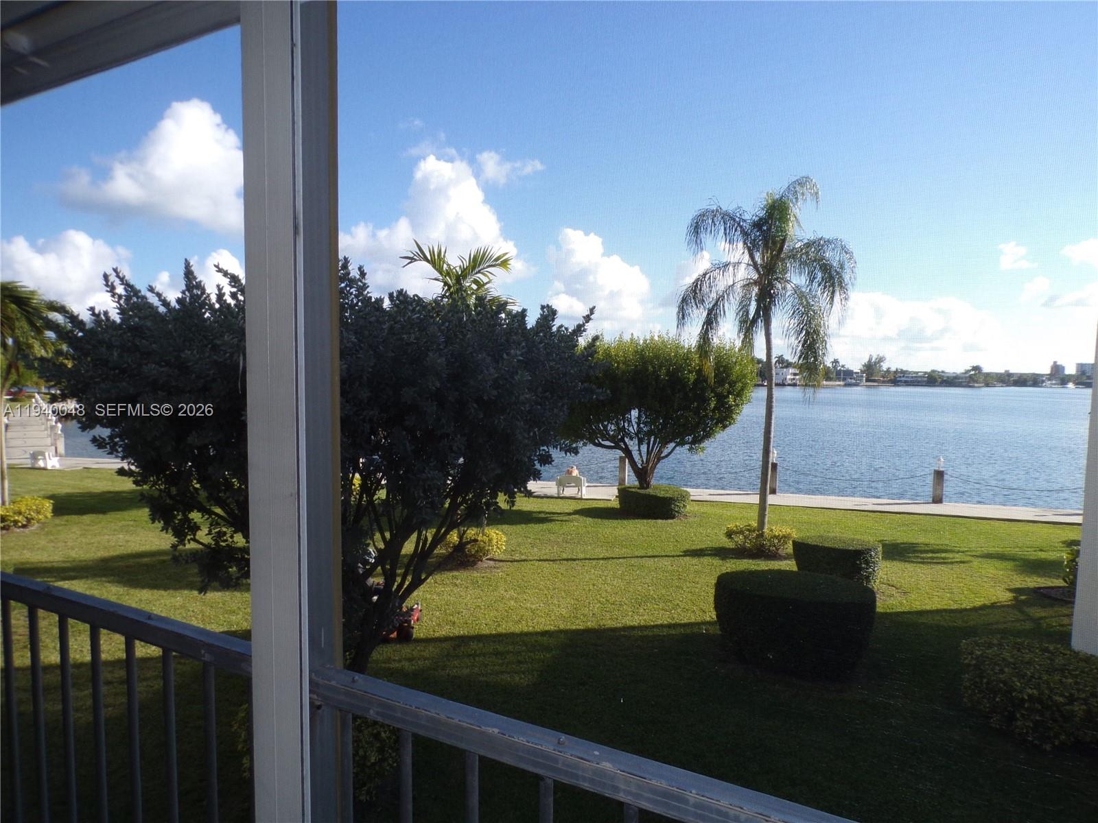 FANTASTIC WATERVIEW FROM THIS CORNER WRAP-AROUND SCREENED BALCONY, LIVING ROOM AND DINING ROOM.  SPLIT BEDROOM FLOORPLAN, BEAUTIFULLY TILED THROUGHOUT--UPGRADED BATHROOMS & KITCHEN WITH NEARLY NEW REFRIGERATOR, STOVE, DISHWASHER, BUILT-IN MICROWAVE AND NEARLY NEW A/C & WH. FURNITURE NEGOTAGLE--READY TO MOVE IN.  CONVENIENT PARKING NEXT TO BLDG.  NICE 55+ ACTIVE COMMUNITY WITH MANY AMENTIES: 24-HR SECURITY GUARD AT GATE, CLUBHOUSE, SHOWS, MOVIES, DANCING, 5 POOLS, GYM, BILLARD ROOM, 2 MILES OF BEAUTIFUL WALKING PATHS AROUND THE LAKE, BOCCE BALL CT, BOAT DOCK, FISHING, AVENTURA COURTESY BUS AND MUCH MORE...CLOSE TO BEACHES, SHOPPING CENTERS, GROCERY STORES, RESTAURANTS, CASINOS, ETC...  HAVE TO LIVE IN UNIT FOR 18 MONTHS BEFORE CAN BE LEASED.