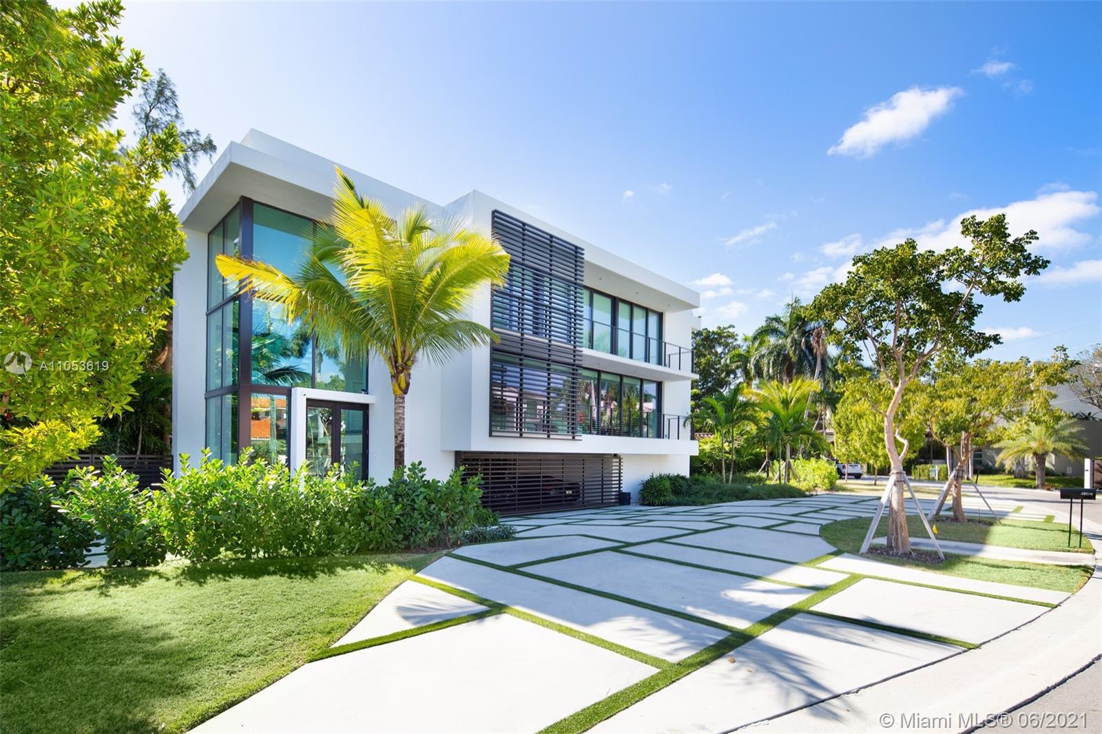This new modern home was designed by award-winning architect Ralph Choeff, and is situated on guard-gated Hibiscus Island. Upon entering the home, you’re immediately greeted with an abundance of natural light from the 20-ft high glass foyer, accentuated by a floating staircase. The open concept interior along with the wide plank white oak flooring feels effortlessly inviting. Interior features include in-home elevator, Sonos surround sound speakers, motorized window treatments, recessed lighting and linear diffusers. The kitchen is a custom design by Mia Cucina, and features Wolf and Sub-Zero appliances. The Master suite offers dual His / Her en suite bathrooms. On the rooftop, the home boasts 600 SF of terrace space that offers 360-degree views where residents will enjoy Miami sunsets.