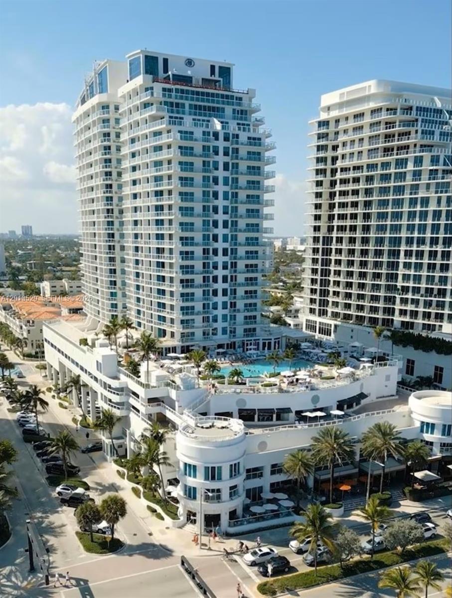 Perched high above the shoreline in the iconic Hilton Beach House, every day feels like a vacation. Here, every detail is designed for ease, luxury.

Wake up to stunning views of the Atlantic, where sunrises paint the sky and the rhythm of the ocean becomes your daily soundtrack. This beautifully positioned residence offers a seamless blend of private ownership and full-service resort living, ideal for those seeking flexibility and elevated experiences without compromise.

Ownership here is more than just a second home; it’s access to a world class lifestyle. Enjoy full Hilton managed services, including concierge, valet, room service, and housekeeping. Indulge in premium resort amenities such as the oceanfront pool, spa, fitness center, and sophisticated on site dining. Whether you are in residence for the season or a long weekend, every need is handled with effortless sophistication.
Experience the benefits of a luxury retreat without the stress of property management. When you aren't here, the on site hotel program manages the logistics of hosting, allowing the unit to offset ownership costs. It’s a seamless way to maintain a beachfront lifestyle while your property remains productive in your absence.

Located directly on Fort Lauderdale Beach, you are steps from vibrant dining, including the only Michelin-starred restaurant in Broward County as well as premier shopping and entertainment.