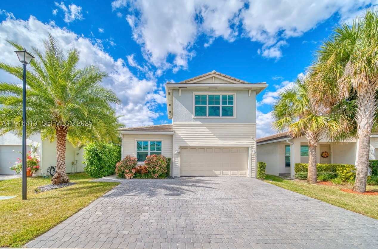 Built in 2021, The highly desired Cisne model! This beautiful 4-bedroom, 3-bathroom home with a 2-car garage offers the perfect blend of comfort, space, and modern style in a prime location. Step inside to a bright, open layout designed for both everyday living and entertaining. The modern kitchen features stainless steel appliances and flows seamlessly into the main living areas, creating a warm and inviting atmosphere. Three of the bedrooms are conveniently located downstairs, including one of the primary suites that has a spacious en suite with dual vanities, walk in shower & a large custom walk in closet. Upstairs, the second primary suite features a large walk in closet & a full bathroom, providing excellent flexibility and privacy. The spacious private backyard is perfect for relaxing or hosting gatherings. Owner also extended driveway and can easily fit three vehicles. Located in the vibrant city of Deerfield Beach, Veleiros offers resort-style amenities and proximity to top-rated schools, shopping, beaches and great value. Call today!