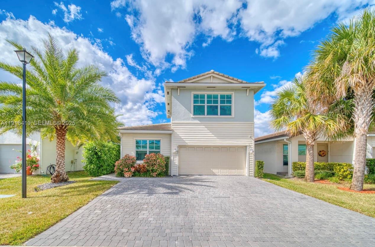 The highly desired Cisne model! This beautiful 4-bedroom, 3-bathroom home with a 2-car garage offers the perfect blend of comfort, space, and modern style in a prime location. Step inside to a bright, open layout designed for both everyday living and entertaining. The modern kitchen features stainless steel appliances and flows seamlessly into the main living areas, creating a warm and inviting atmosphere. Three of the bedrooms are conveniently located downstairs, including one of the primary suites, providing excellent flexibility and privacy. Enjoy a rare dual primary suite layout, ideal for multigenerational living, guests, or rental potential. The spacious private backyard is perfect for relaxing or hosting gatherings, while the extended driveway offers additional parking space for convenience.Located just minutes from beaches, major highways, shopping, and dining, this home delivers comfort, convenience, and great value. A must-see opportunity in Pompano Beach! Call today!