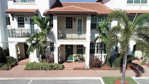 Stunning townhouse in South Florida! This beautiful home features 3 bedrooms and 2 bathrooms, complete with walk-in closets. Enjoy the convenience of an in-unit washer and dryer. The property also includes a spacious two-car garage with extra storage. Plus, you’ll love the fabulous community pool!