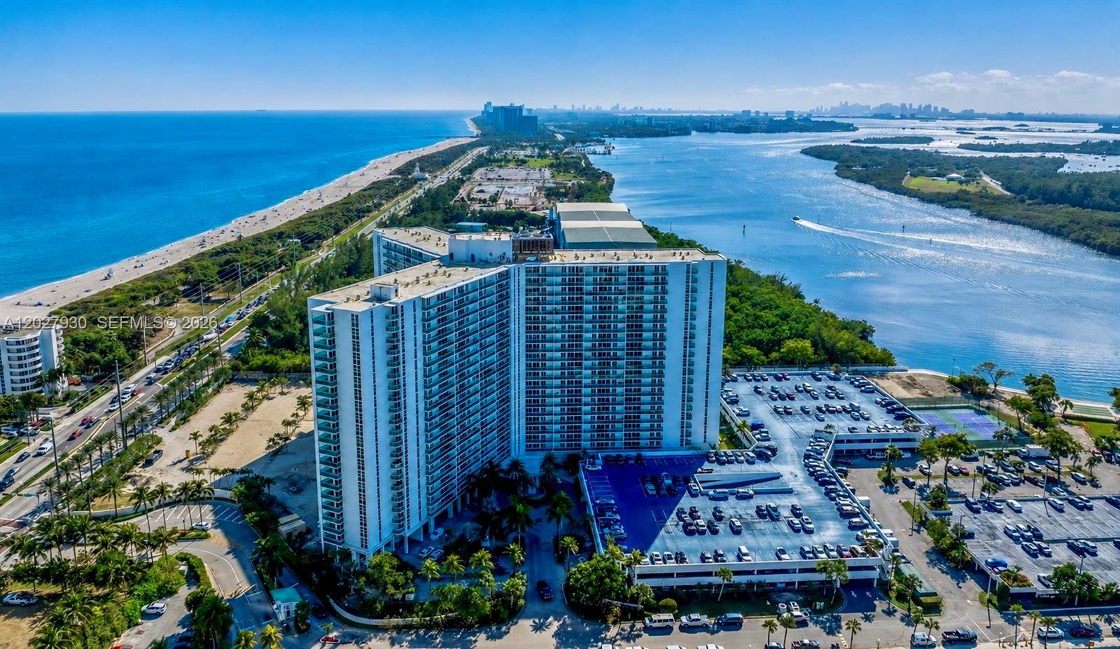 Fully furnished and modern 2-bedroom, 2-bathroom residence at Arlen House East, offering 1,331 square feet of spacious living. Floor-to-ceiling impact windows fill the home with natural light and frame expansive views of the Intracoastal Waterway, Atlantic Ocean, and city skyline. A private balcony facing the Atlantic Ocean provides ideal sunrise views and ocean breezes. The residence features contemporary furnishings, a newer air-conditioning system with hydro handler, and generous walk-in closets for comfort and functionality. Assigned parking included, with valet parking available for residents and guests. Resort-style amenities include a heated pool, fitness center, tennis courts, valet parking, concierge services, on-site café, and marina access. Prime oceanfront location in Sunny Isles Beach, close to shopping, dining, and major roadways. Leased with tenants through February 1st 2027