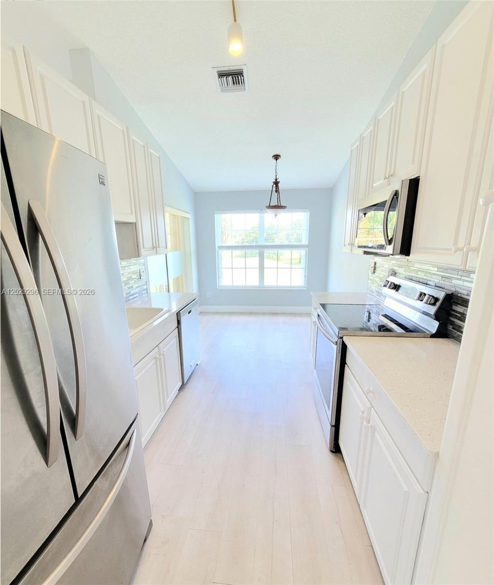 ST TROPEZ AT BOCA GOLF CO - Residential Lease