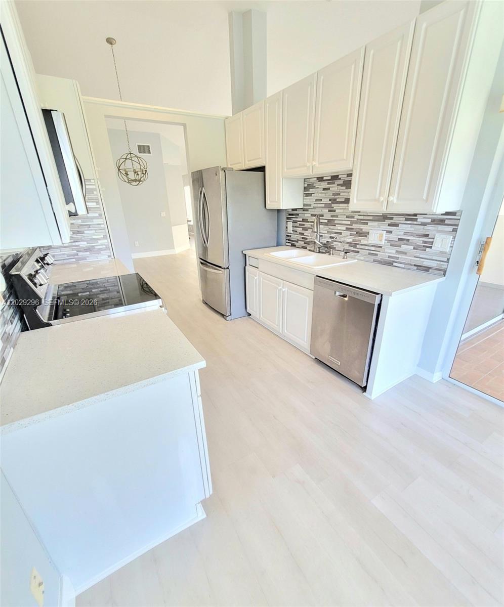 ST TROPEZ AT BOCA GOLF CO - Residential Lease