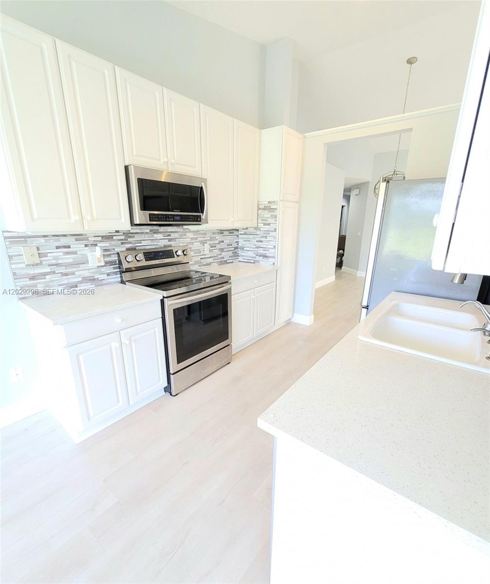 ST TROPEZ AT BOCA GOLF CO - Residential Lease