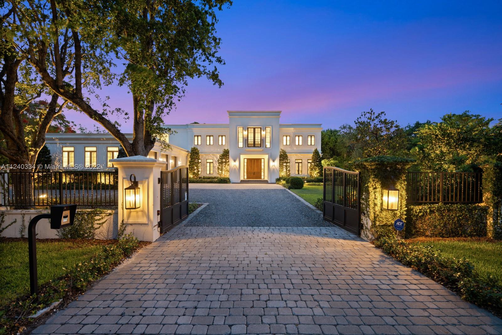 5255 Snapper Creek Road is located in the gated community of Snapper Creek Lakes. The home is move in ready and being offered furnished. Completed in 2020, radiating architectural sophistication and novelty, this highly sought-after corner lot features over 47,916 sf and is surrounded by lush landscaping and mature oaks providing privacy. Structurally designed as a solid bunker with poured concrete roof, cgi impact windows and doors while also being outfitted with elegant finishes and vaulted ceilings. The custom kitchen is outfitted with Wolf/Subzero appliances and quartz countertops. Grand master suite offers the upmost privacy with its own wing of the house, private balcony, and lavish spa bath. Secondary bedrooms are very generously sized, offer balconies, and en-suite bathrooms.