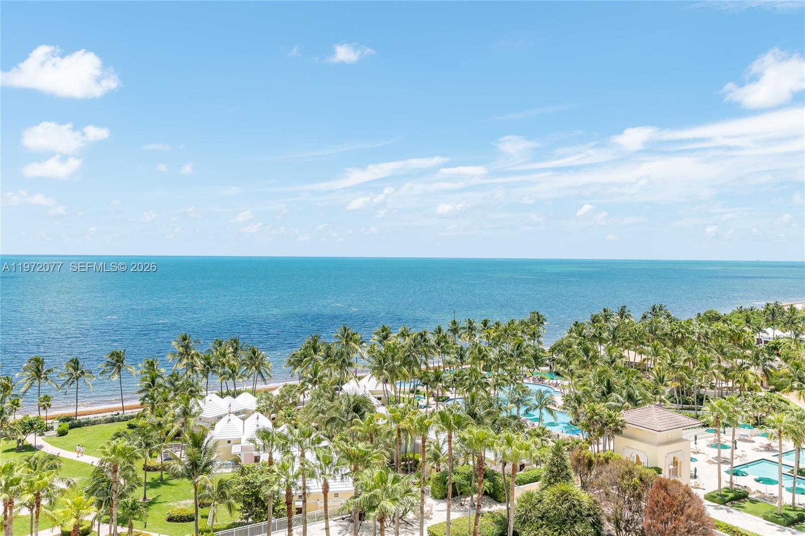 Exceptional floor-thru views of Atlantic Ocean and Miami Skyline from this most sought after "D model" apartment. From your private elevator step right into this oversize 3 bd. (en suite) plus separate staff quarters, 4 and a half baths. Formal living and dining rooms. Kitchen/family room combo converted into eat-in kitchen and bedroom #4. Marble floors in all social areas. Easy to show by appointment