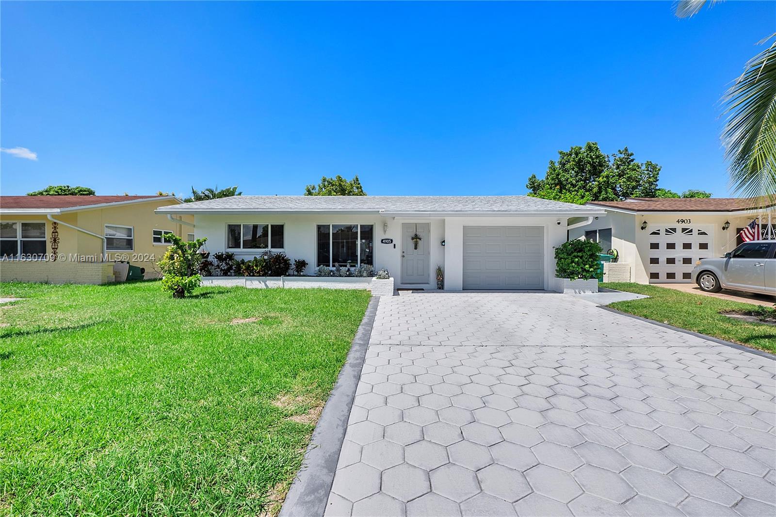 Beautiful 2 Bed 2 Bath Home With 1 Car Garage Located In The Heart Of Tamarac. NEW Roof 2024. Tile Floors And Impact Windows Throughout. Newly Painted Inside And Outside. Open Layout Kitchen With LED Lighting, Quartz Countertops, Tan  Cabinets, Tile Backsplash, Snack Bar And Stainless Steel Appliances. Primary Bedroom With Large Closet, Ceiling Fans And Blinds. The En-Suite Bathroom With Large Linen Closet, New Vanity, Tile In Floor &  Wall, And Walk In Shower. Second Bedroom With Ceiling Fan And Closet. Upgraded Hall Bath With Tile Floors, Tile Walls, Shower/Tub, Wood Vanity And Toilet. Newer Samsung Washer/Dryer. Garage Auto Opener. Updated Electric Panel. Low HOA! A Must See!!