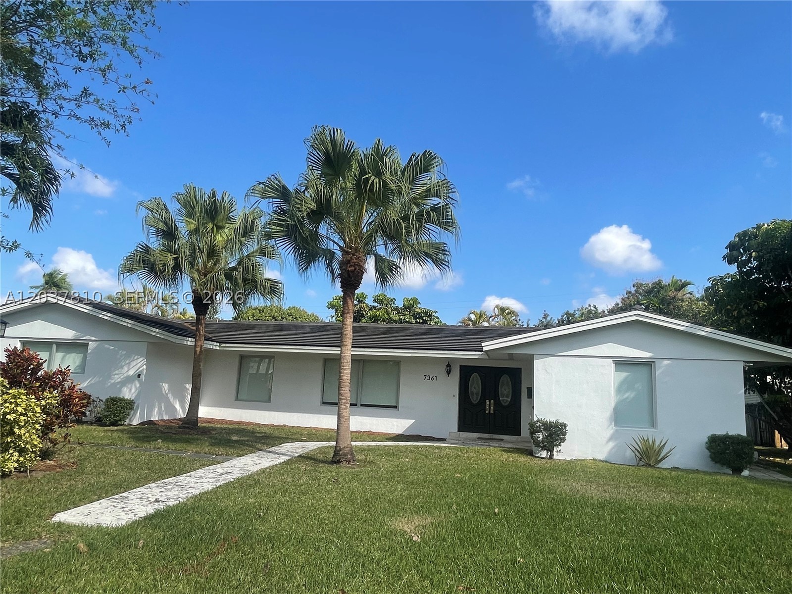 Enjoy living in the heart of Pinecrest.  This house has hurricane impact windows and doors, stainless steel appliances, marble floors, pool, alarm system and custom built in closets.