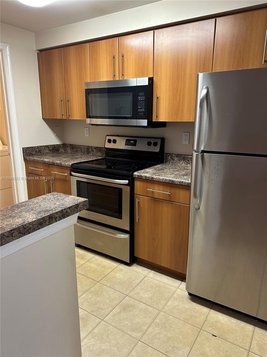 EL-AD POINCIANA CONDO - Residential