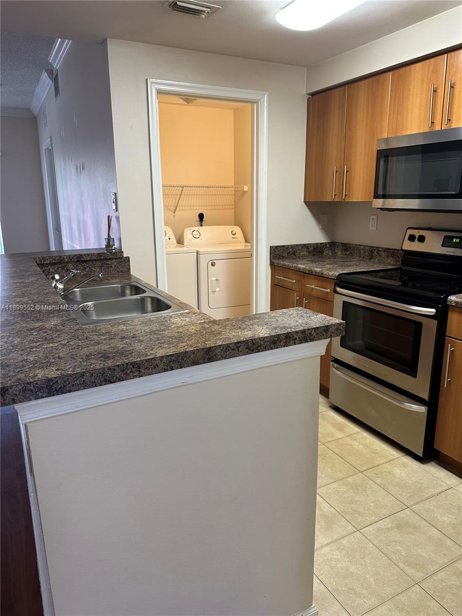 EL-AD POINCIANA CONDO - Residential