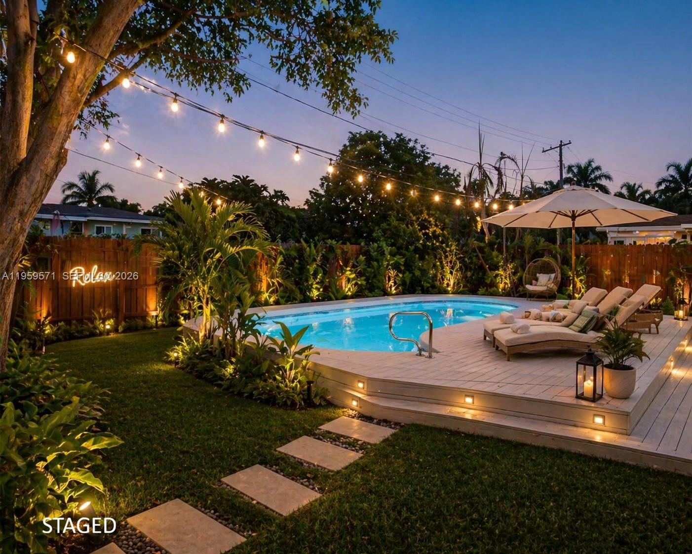 GORGEOUS 2BED/2BATH TURN KEY READY POOL HOUSE AT THE GREAT LOCATION! This beautiful spacious home has an open concept with lots of space. A big patio leads to a tropical oasis with a large swimming pool, perfect for entertainment and relaxing. Impact doors and windows, a brand new roof, high-end finishes and top of the line appliances. No HOA, perfect for investors / Airbnb and absolutely amazing for a vacation home or living permanently! Located in the coveted east side of A1A and just 1.5 miles to the beach boardwalk. 5 minutes from Young Circle Park, golf course or a short drive to Hardrock Casino. And by the way, this house has the most delicious Mangoes you will ever try! Call us and arrange a private showing today!
