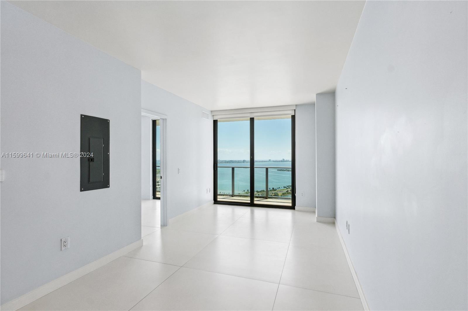 Experience sophisticated living in this 1 bed / 1.5 bath plus den, featuring breathtaking water views from every room. Unit is spacious and bright. Enjoy Bosch appliances, a GE washer and dryer, dual-door shower, and dual sinks in the master bath. Porcelain floors through out the unit. Freshly painted and never rented. 
The full-service building boasts a rooftop pool on the 46th floor, a second pool on the 5th, a spa, sauna, state-of-the-art gym, kids room, and a social room with billiards and projection TV. On-site management, valet service, and one assigned parking space included.