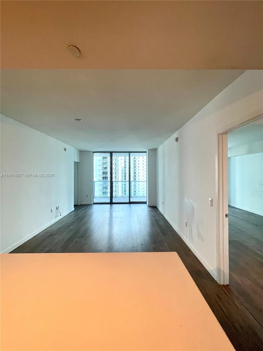 Spacious 2-bedroom, 2-bath residence with den, featuring elegant wood floors throughout. The modern Italian kitchen is equipped with stainless steel appliances and quartz countertops, perfect for both everyday living and entertaining. Enjoy a large balcony with stunning views of the Miami skyline.
This full-service building offers 24-hour security and exceptional amenities, including a rooftop pool. Ideally located on South Miami Avenue, just steps from fine dining, shopping, banks, public transportation, and vibrant nightlife. An exceptional opportunity to own in one of Miami’s most desirable locations.