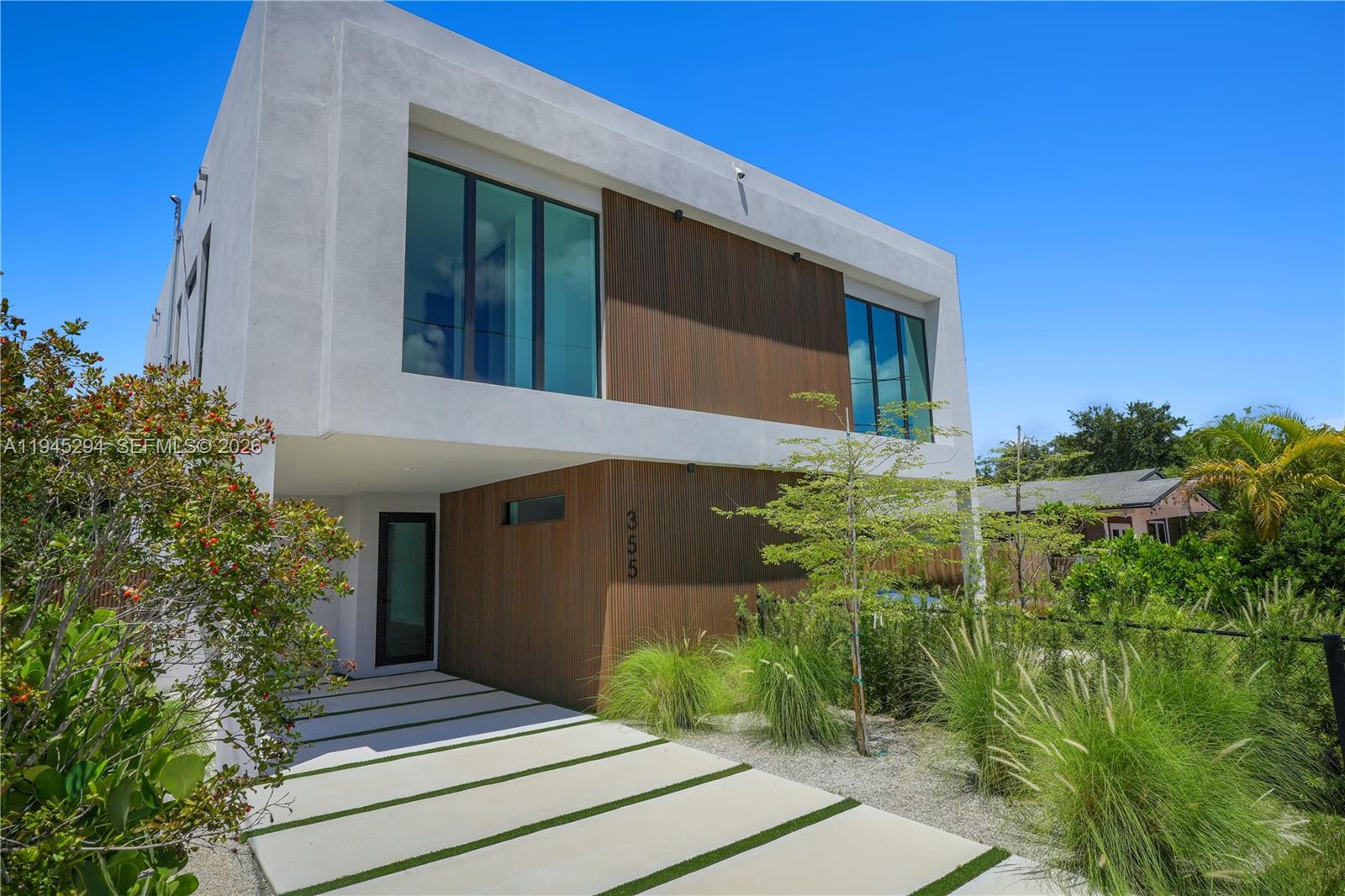 Be the first to live in this beautifully designed modern townhome with pool near The Miami Design District. Bold kitchen with high end appliances, open living area, Hansgrohe bathroom fixtures & real hardwood flooring. 3 beds & 2.5 bath with 1,900 total sq ft. Built almost 12' above sea level in Miami's Buena Vista subdivision, a neighborhood close to everything that has one of the highest elevations in the city. Coupled with the hurricane resistant windows & doors, you'll be ready for any potential effects of climate change. Not in a flood zone. Near Wynwood and Midtown. Miami Beach is a short drive.