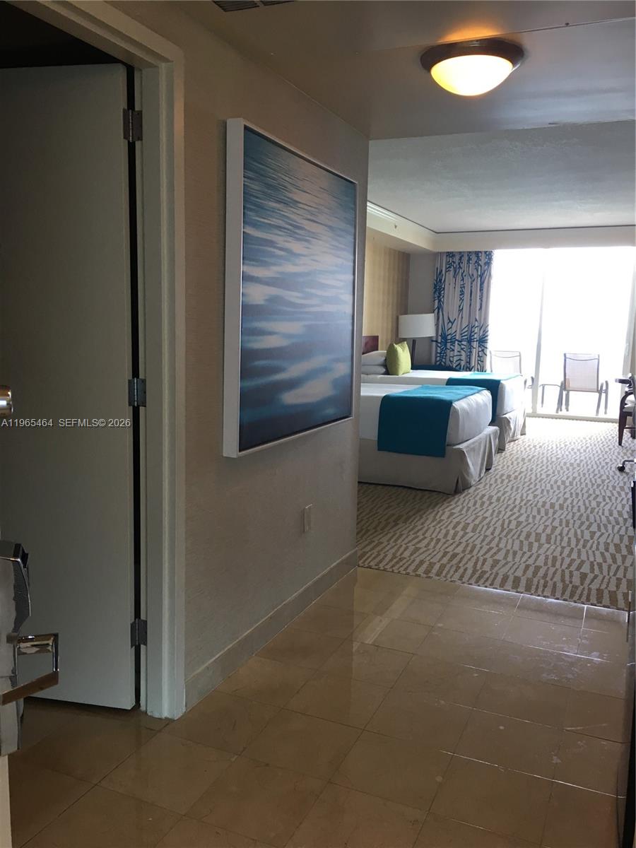 DELUXE CONDO-HOTEL STUDIO AT TRUMP INTERNATIONAL BEACH RESORT IN THE HEART OF SUNNY ISLES BEACH. UNIT HAS DIRECT OCEAN VIEWS, IS FULLY FURNISHED. BUILDING HAS PRIVATE BEACH ACCESS, CONCIERGE SERVICE AND LUXURIOUS AMENITIES SUCH AS STATE OF THE ART SPA, TOP OF THE LINE FITNESS CENTER, RESTAURANTS, BAR, TWO LUSH POOLS, CHILDREN PLAY AREA, AND MANY MORE. CLOSE TO AVENTURA MALL AND BAL HARBOUR SHOPS. GREAT INVESTMENT OPPORTUNITY!