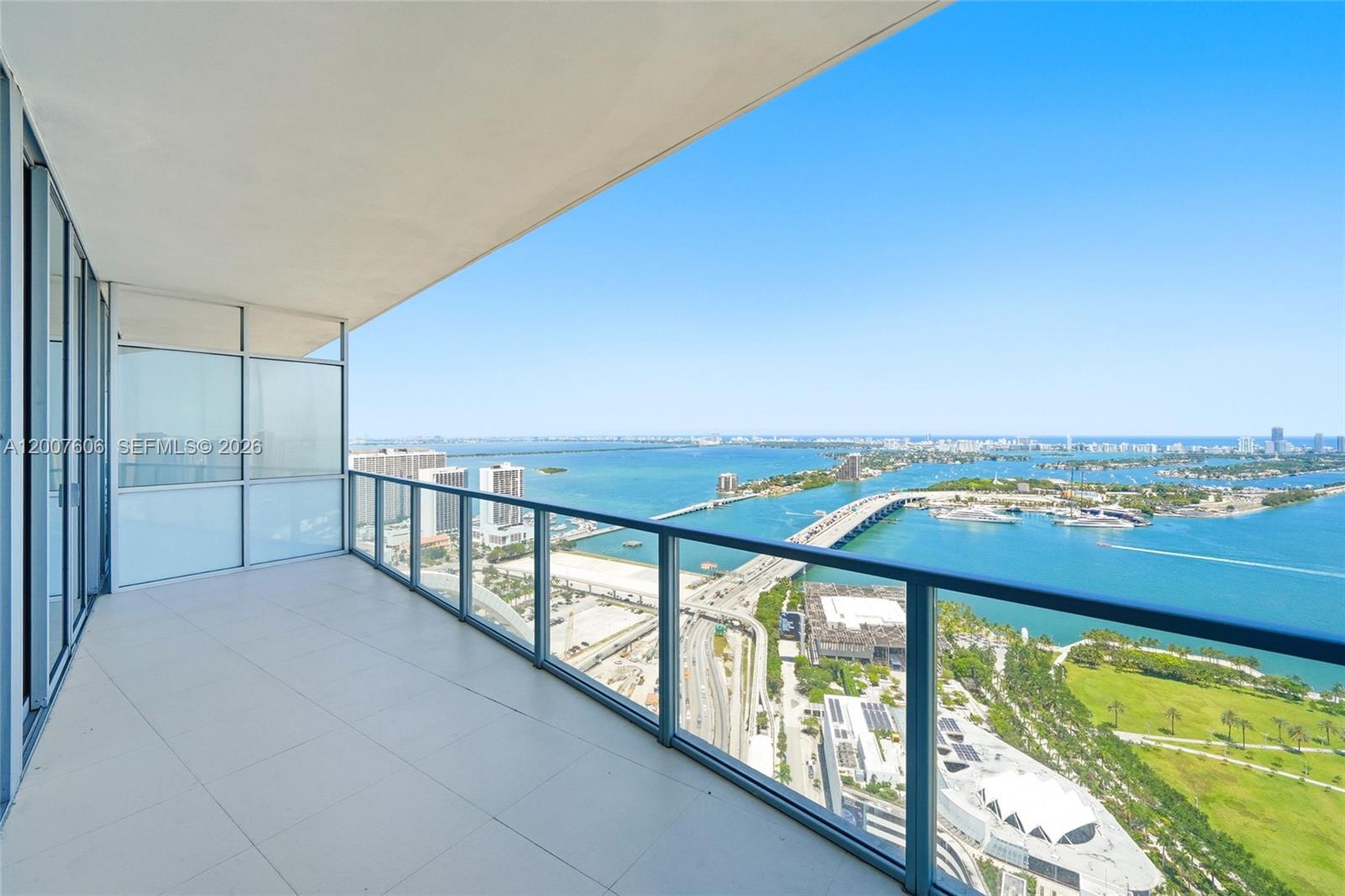 Unit 4402 presents spectacular, unobstructed panoramic views of Biscayne Bay and the Atlantic Ocean through floor-to-ceiling high-impact windows.2 bedrooms and 2.5 bathrooms, this exquisite residence in the prestigious Marquis Condo offers the pinnacle of urban luxury. Experience ultimate privacy as the private elevator arrives directly at your unit, opening into a high-rise masterpiece. 
Unit features porcelain floors, stainless steel appliances, built-in closets, and high ceilings. As a resident, you will enjoy world-class amenities: a heated pool, an expansive spa, a sauna, a gym, and an on-site hotel for your guests. The building ensures total peace of mind with 24/7 concierge service, lobby security, a secure garage, and valet parking. Every detail—from the private entry to the breathtaking views—defines luxury living. Easy to show. Please see the broker's remarks.