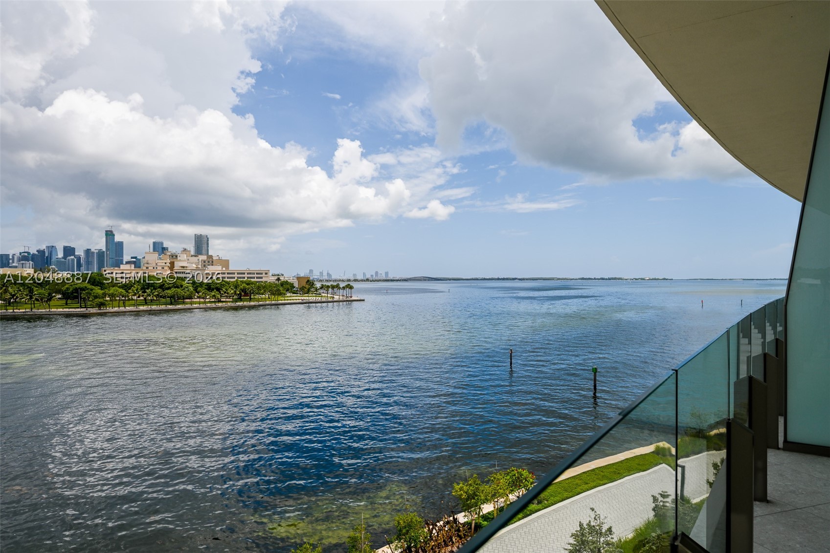 Experience the pinnacle of waterfront luxury at Vita at Grove Isle, an exclusive private island enclave in Coconut Grove. This exceptional 3-bedroom, 3.5-bath residence offers refined living with soaring ceilings, expansive interiors, deep wraparound terraces, and breathtaking Biscayne Bay views. Designed for seamless indoor-outdoor living, the home features elegant contemporary finishes and a sophisticated Italian Molteni&C kitchen, creating an atmosphere of timeless modern elegance.
Set on a private 20-acre island, Vita at Grove Isle offers an unparalleled resort lifestyle with a private marina, Baywalk Promenade, and exclusive access to the Grove Isle Club featuring tennis, pool, spa, and waterfront dining. A rare opportunity to enjoy privacy, serenity, and world-class amenities just minutes from the vibrant charm of Coconut Grove.