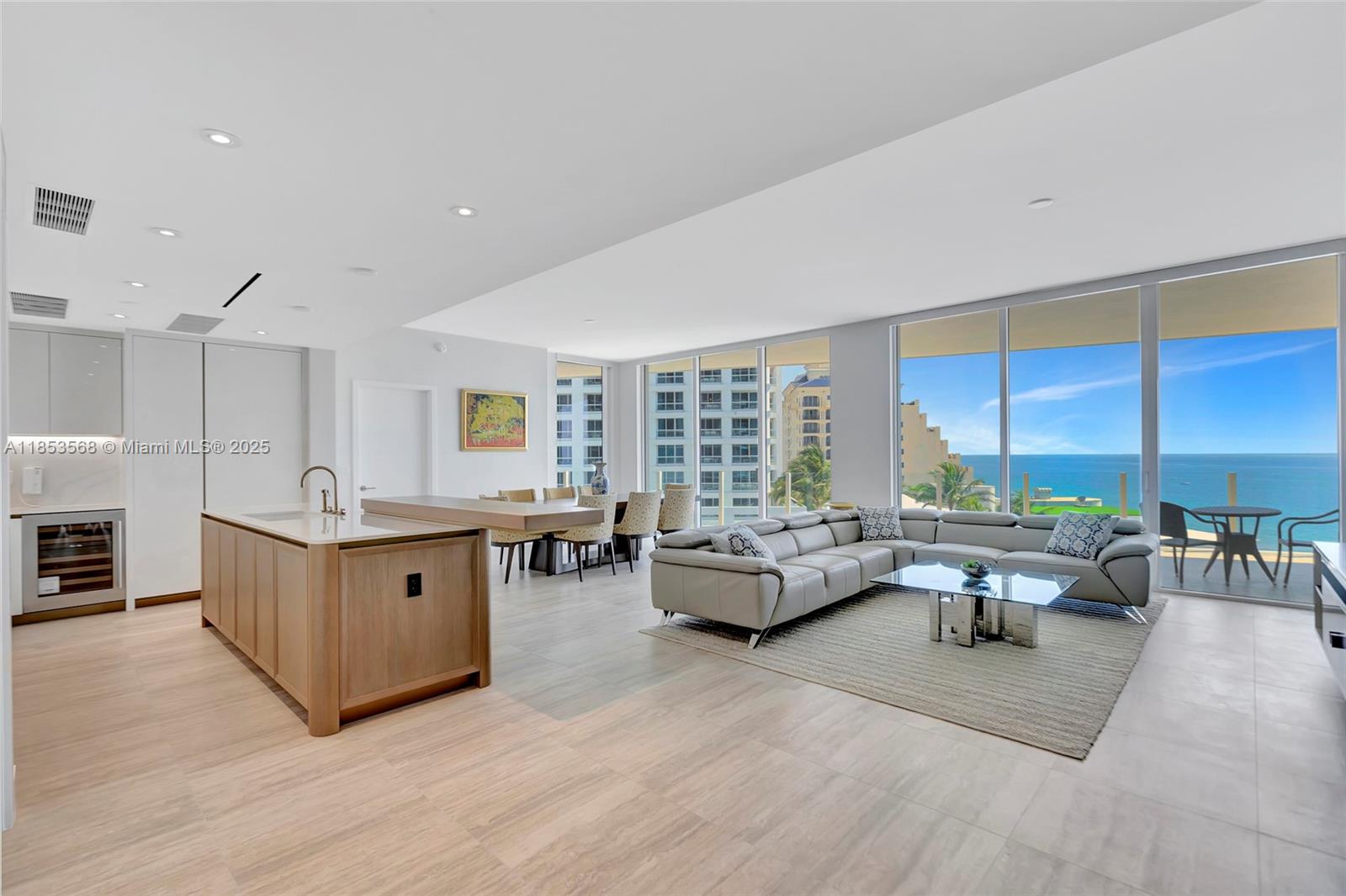 WELCOME HOME to the Four Seasons Private Residence 802. This 2 bed + Den, 3 bath unit is move-in ready. Recently finished with luxurious tile flooring, window treatments, paint & custom walk-in closets. Enjoy Northeast Oceanviews from all rooms with dramatic floor to ceiling glass that fill the unit with bright natural light and & expansive oversized terraces from all rooms. Gourmet kitchen with custom lacquered cabinetry, Sub Zero & Wolf appliances. Primary owner's retreat configuration optimizes privacy between you & guests. Offering an abundance of closet spaces throughout with flexible uses. Baths are adorned with signature marble & custom oak cabinetry. The Private Residences is A full-service Five Star building with award-winning fitness center & spa, dining, & parking for 3 vehicles