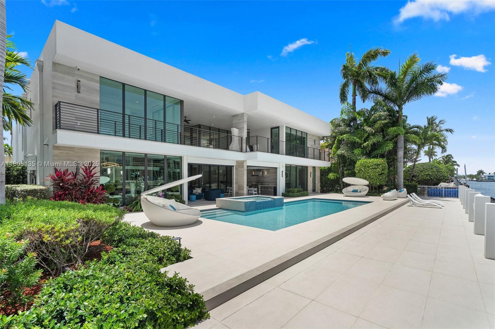 The Lucille Estate. Coastal Modern Masterpiece in Harbor Beach / 95 Feet of Deepwater Canal Frontage/Concrete Dock/No Fixed Bridges/Direct Ocean Access/Expansive Resort-Style Outdoor Living/Covered Deck w Custom Outdoor Kitchen/Oversized Pool + Spa /Chef’s Kitchen/Designer Bar + Wine Cooler/Stunning Centerpiece for Entertaining/Floor-to-Ceiling Impact Windows/Private Home Office/Elevator/Fully Automated Smart Home/ 1st Level VIP Suite or Secondary Master/Ultra-Luxurious Master Suite + 3 Add En-Suite Bedrooms Upstairs/ Spacious 3-Car Garage/Located in Gated & Exclusive Harbor Beach/Private Beach Club & Marina Access/Minutes to Las Olas Blvd/World-Class Dining, Shopping & Nightlife/15 Min to Fort Lauderdale Intl. Airport/In the Heart of the Yachting Capital of the World. Sold turn-key!