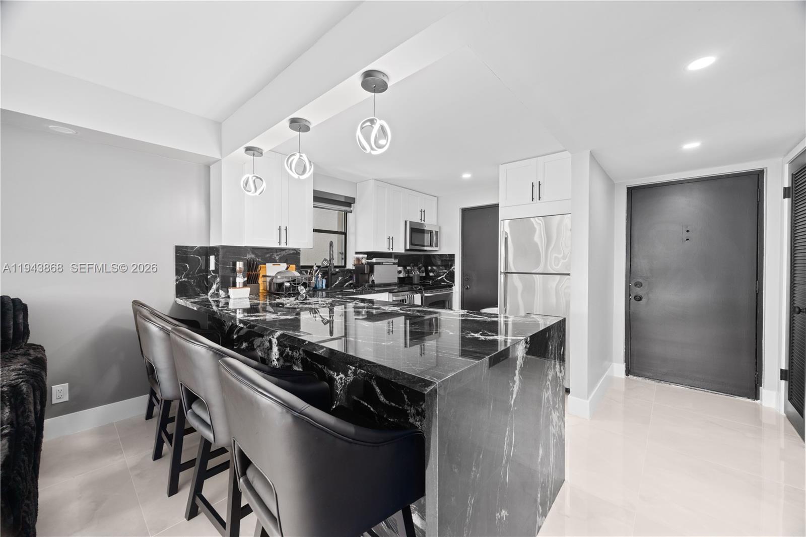Come see this fully renovated 2 bedroom 2 bathroom, corner unit condo with all new stainless steel appliances, brand new A/C 2025. New hot water heater 2025. Hurricane shutters. Unit is available with all furniture and fixtures as shown. Close proximity to highways, restaurants and walking distance to Harrah's Casino! Condo offers a large swimming pool, fitness center and clubhouse.