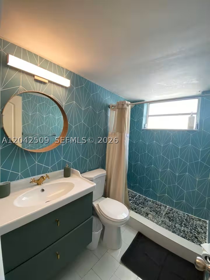 713 COLLINS CONDO - Residential Lease