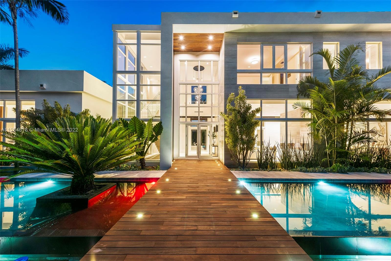 The Crown Jewel of Pinecrest is now complete!A spectacular masterpiece that brilliantly blends modern design w/ extraordinary craftsmanship & the highest attention to detail & finishes w/all the luxury imaginable.Millions 
in upgrades done by renowned landscape & design teams,this newly constructed Smart Home takes luxury living to the highest level.Soaring ceiling, accent lightings, custom millwork, floor-to-ceiling walls of glass,an Epicurean gourmet kitchen,wine cellar & a Hollywood-esque media room. Lavish master w/ the ultimate dream closets.Inspired by the beauty & sophistication of Bali & infused w/ modern zest. This stunning masterpiece is further enchanced w/ water features,resort style pool/patio, summer kit & cabana!Manificent grounds w/all special tropical plantings! Paradise!