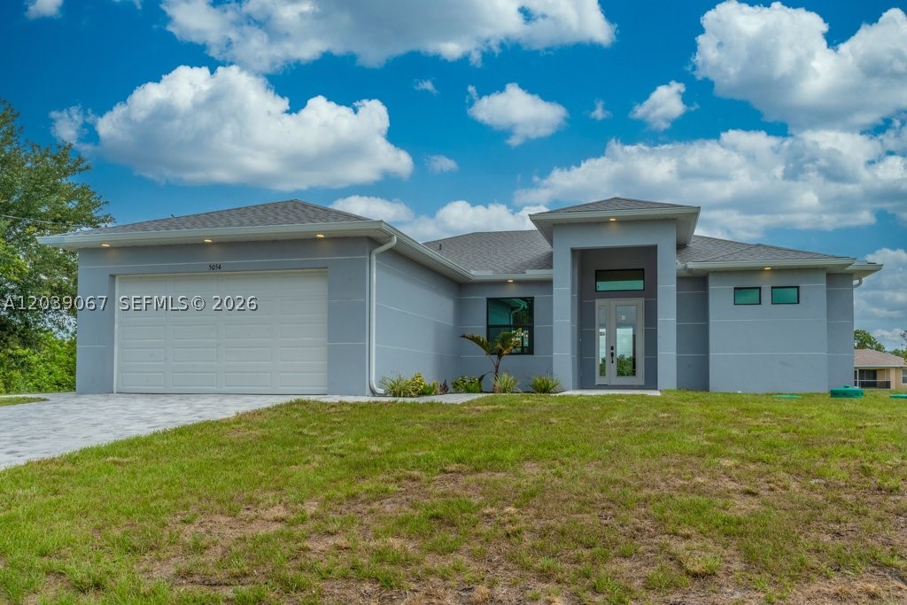 Move-In Ready Home with Luxury Features

Upon approaching this stunning home, you will be greeted by a beautiful paver driveway that sets the tone for the elegance that lies within. As you step inside, you will be welcomed by an open-concept living area that is perfect for both family living and entertaining. The kitchen is beautifully appointed with a quartz center island, stainless steel appliances, and a pantry for added convenience.

One of the unique features of this home is that each bedroom has its own bathroom, providing privacy and comfort for all residents. The primary master suite is a true retreat, offering a spa-inspired bathroom with a soaking tub, walk-in shower, his and her sinks, and walk-in closets.

The large laundry room is equipped with cabinets and a sink, providing ample workspace for all your laundry needs. The garage features an epoxy-finished floor, adding a touch of luxury to this space.

For those who love outdoor living, this home has a covered lanai with exterior tile flooring, perfect for enjoying the Florida weather. Step outside to the extended covered back patio, which features a large tiled deck with three access areas, ideal for outdoor entertaining and future pool area.

This home is equipped with hurricane-impact windows and doors, providing peace of mind during storm season. Additionally, if you enjoy fishing, you will love the canal located behind the home, offering a convenient and relaxing fishing spot just steps away from your back door.

Don't miss the opportunity to make this move-in ready home with luxury features your own.