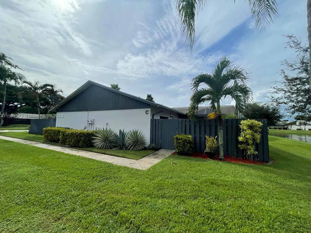 This gorgeous 3 bedroom, 2 bath, one-story villa. Facing the lake w/ fountain, next to the clubhouse. 2 large master bedrooms, & third bedroom great for children/Den/Office. Large closet/storage spaces. Along w/ attic space. Only 1 year old Carrier AC unit, washer/dryer. Updated open concept kitchen, w/ white cabinets, & Samsung stainless steel appliances. Both baths are beautifully updated. Waterproof Tranquility floors & spacious extra large screened-in patio. Great for grilling & family gatherings. Hurricane panels included. Next to large Pool & Jacuzzi, tennis, children’s playground w/ slides & swings. The clubhouse also includes a sauna, & available space for rent for your social gatherings. Gated community w/ low HOA fees only $190 per month. Five-minute drive to Public and Walmart.
