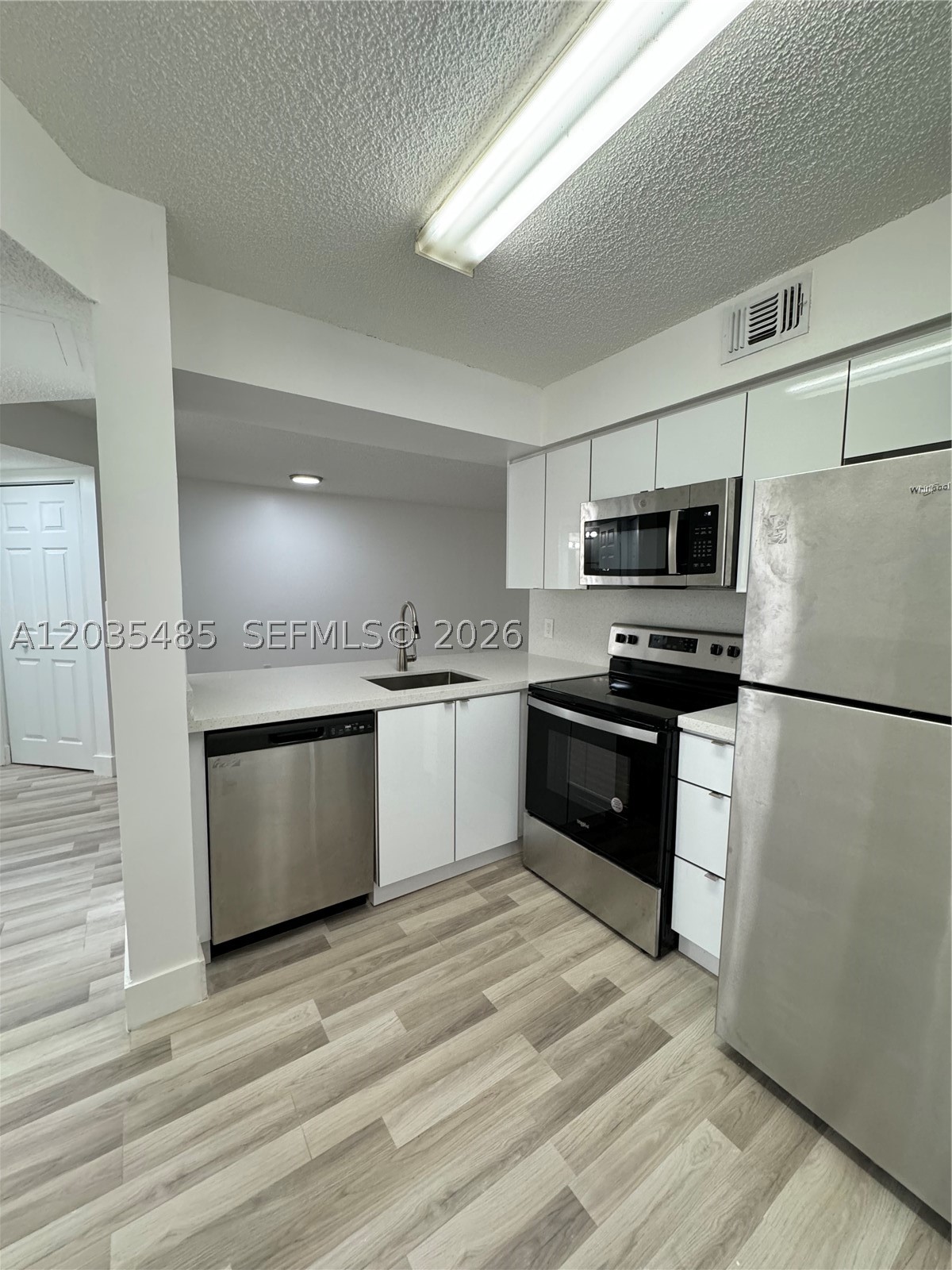 NAPOLI GARDENS AT CORAL S - Residential