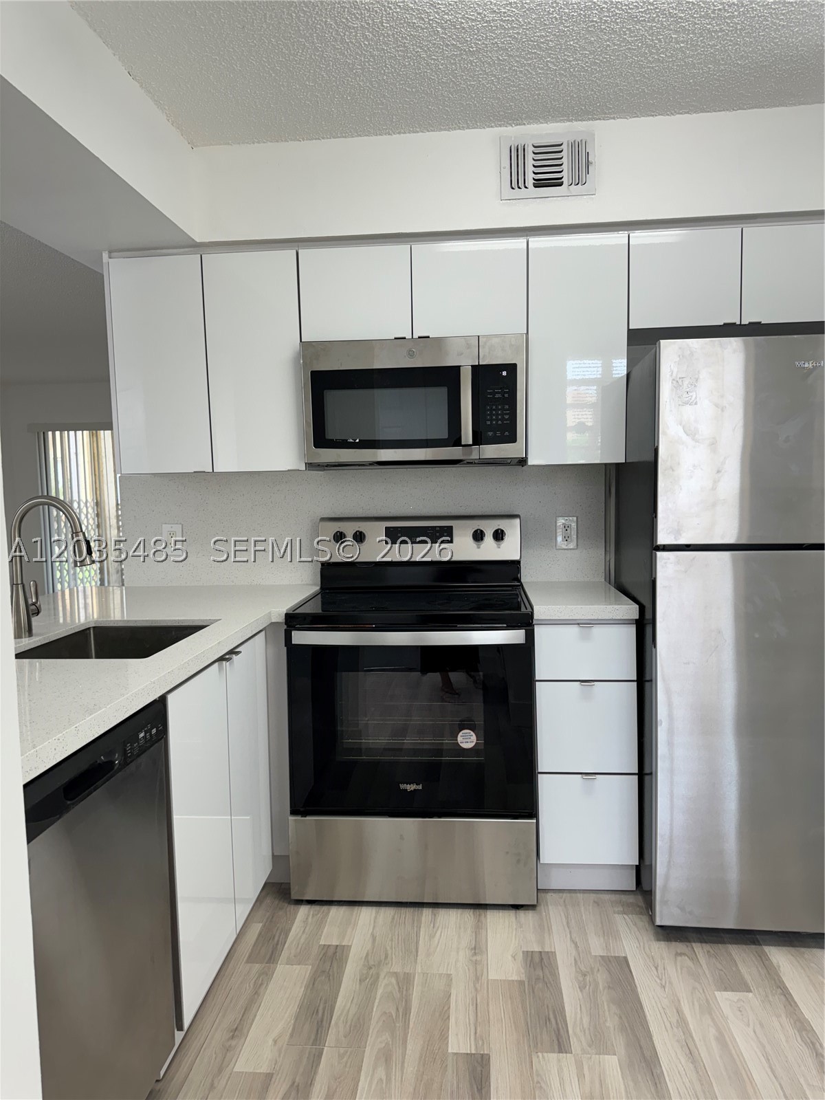 NAPOLI GARDENS AT CORAL S - Residential