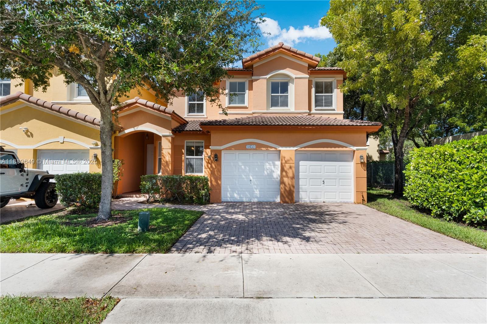 Bright and spacious corner home right in front of K-8 Center Dr. Rolando Espinosa. Features 4 bedrooms and 3 full bathrooms with one full bedroom and bathroom downstairs. Double car garage, freshly painted, New stainless steel appliances, no carpets and 2017 A/C Unit. Access to Islands at Doral Club House on 112th Ave with Tennis and Basketball courts, pool, child play area, lounge and much more. First time home buyers welcome. Easy to show.