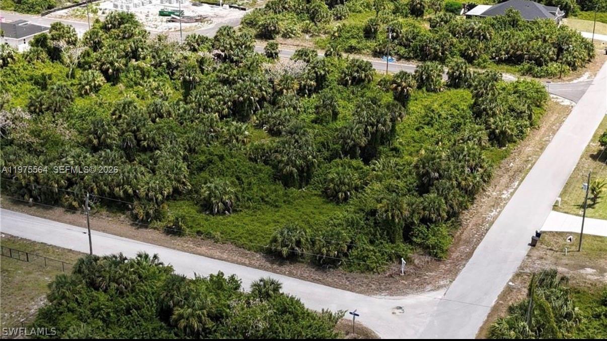 Fantastic opportunity to own this desirable corner lot located at 327 Lancelot Ave in the growing community of Lehigh Acres! This oversized residential lot offers added flexibility for your future home design, with extra space for a side-entry garage, larger driveway, or enhanced landscaping. The corner location provides additional privacy, improved accessibility, and excellent curb appeal potential.

Zoned for single-family residential use, this property is ideal for building your custom dream home or holding as an investment in one of Southwest Florida’s fastest-developing areas. Conveniently located with easy access to SR-82, schools, shopping, dining, and just a short drive to Fort Myers and surrounding areas.

New construction homes are actively being built nearby, making this a great opportunity . No HOA and no time restrictions to build. Don’t miss the chance to invest in this well-positioned corner lot in a rapidly expanding neighborhood!