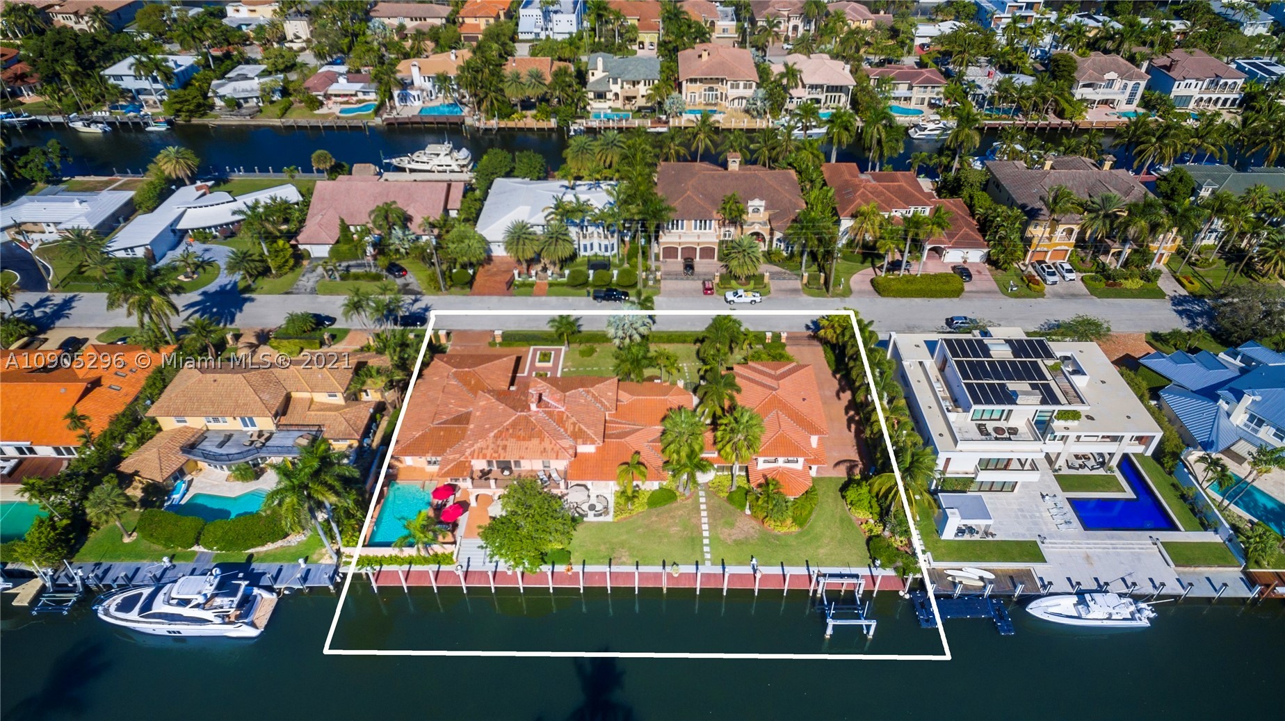 Large sprawling estate in coveted Seven Isles in Fort Lauderdale. Sitting on 200 ft of deep waterfrontage this property can be split into 2 lots. Amazing development opportunity! With a 26,024 square feet, this Mediterranean home boasts 8,000+ square feet of interior square footage. Located just minutes from the inlet, this location is truly priceless! This estate is gated with double entrances, features a large split floorplan, lush greenery, large chef’s kitchen, a library and multiple spaces to entertain including a grand backyard. This property also features a guest house, private dock and boat lift with easy access as it’s located only a few lots from the wide-open water. Don’t miss this opportunity in this amazing location!
