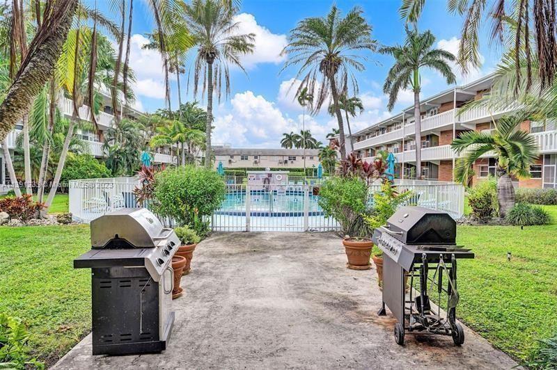 First Floor entry, serene view to garden and pool. Impact doors and Windows, Bright and Patio Remodeled kitchen and Bathroom Lots of natural light, completely furnished, turnkey unit, all you need is your toothbrush. Lots of closet space and additional storage. Roof is 5 years old, building tented in 2018.  Upgraded Electrical and AC. Lots o Closet Space and additional Storage. Heated pool, outdoor bbq,  Steps from Gulfstream Park, walking distance to restaurants, shops, 2 blocks from Hallendale Beach Blvd